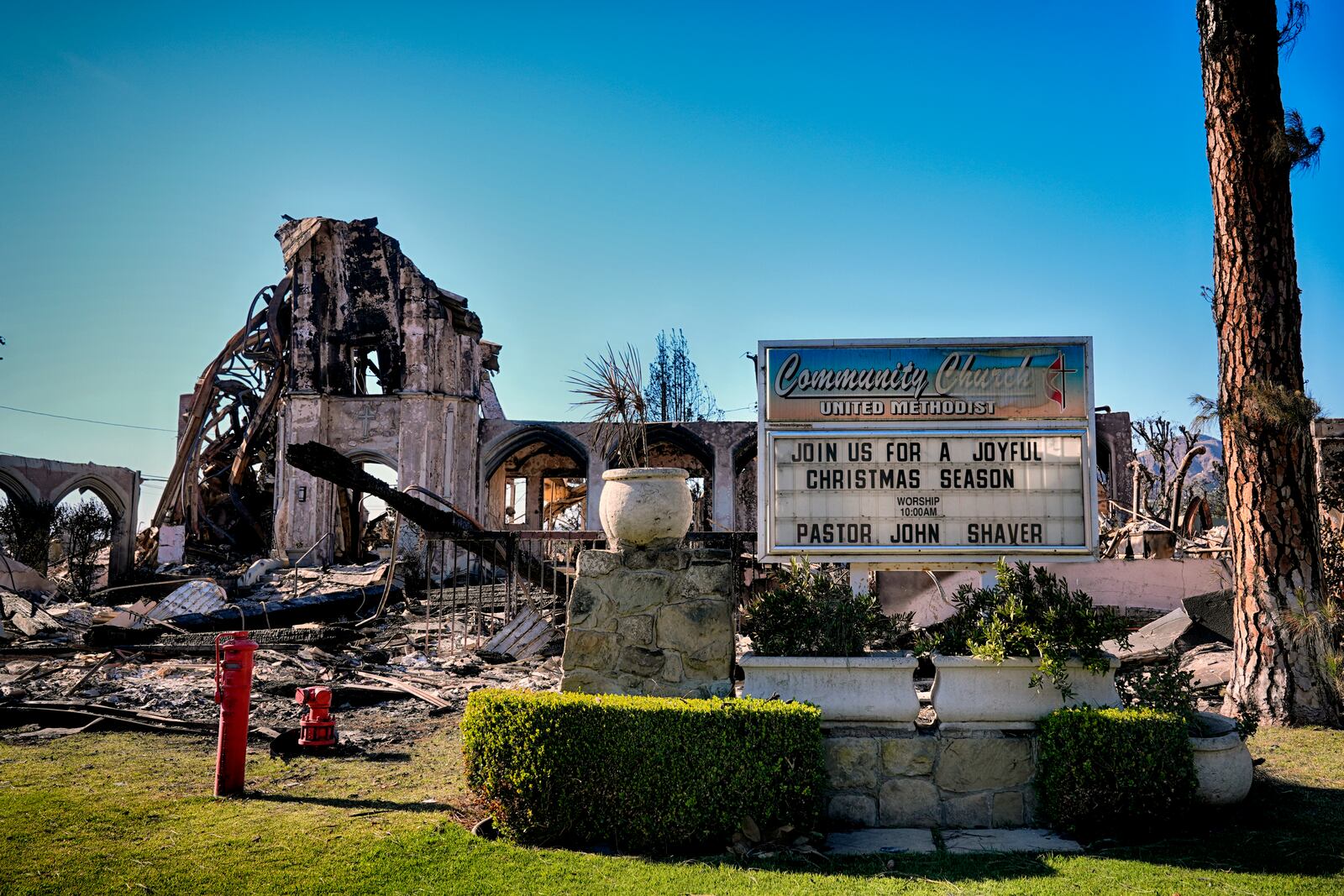 FILE - The remains of the Community United Methodist Church stands amid rubble left from a wildfire that spread through the Pacific Palisades neighborhood of Los Angeles on Wed. Jan. 15, 2025. (AP Photo/Richard Vogel, File)