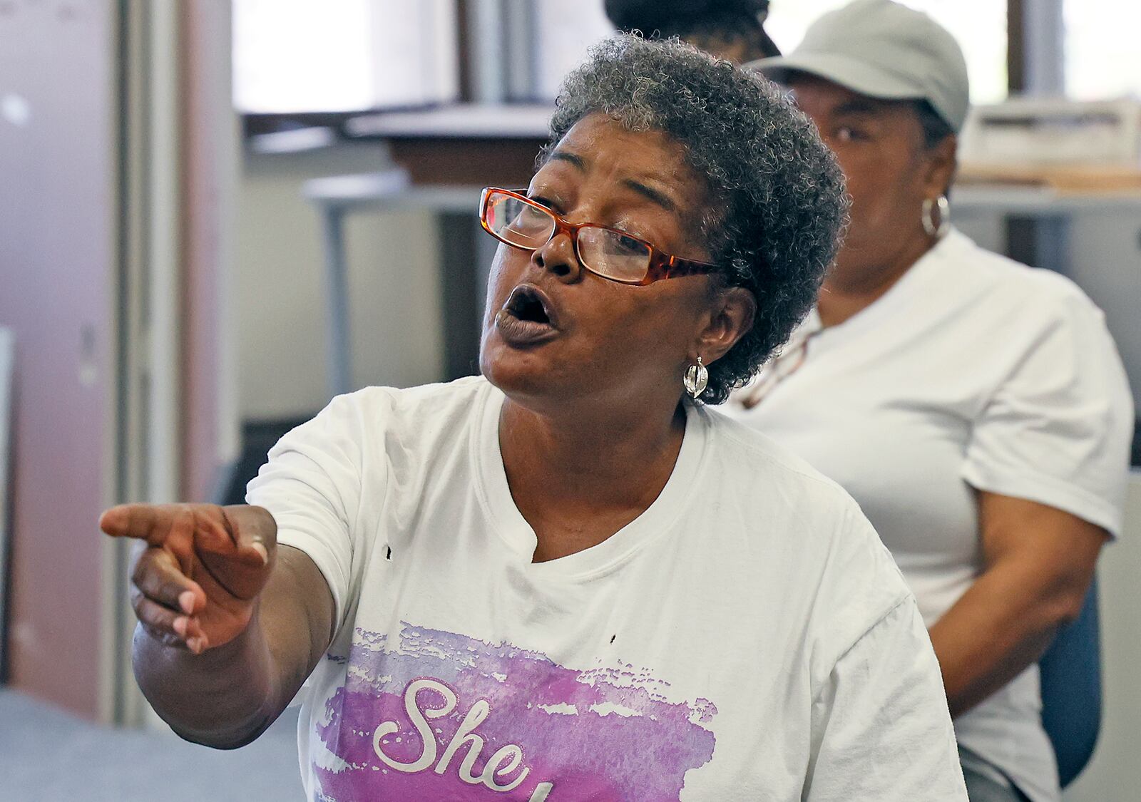 Regina Wilson, the mother of Eric Cole, asks questions about her son's death during a press conference with City of Springfield officials Wednesday. BILL LACKEY/STAFF