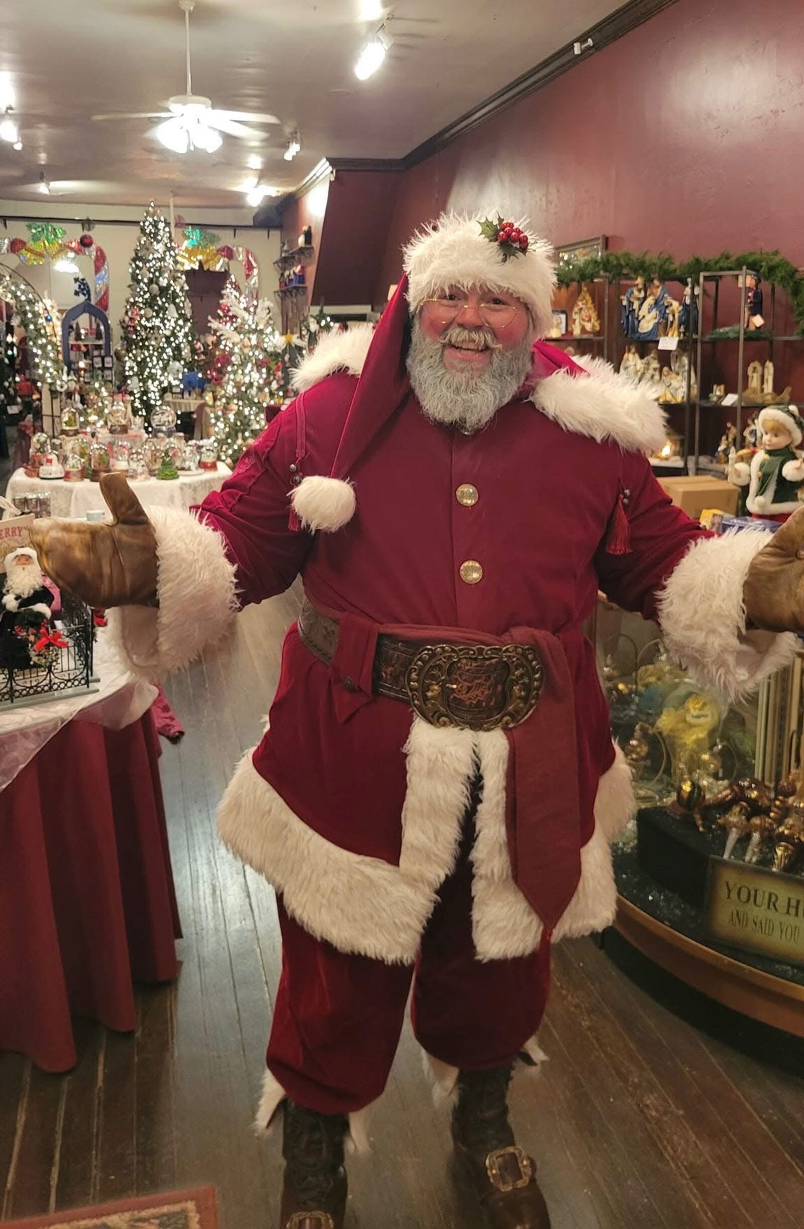 Mike Paugh, 39, of Trenton, dresses up as Santa and appears in Christmas parades, local schools and private events. PROVIDED PHOTO