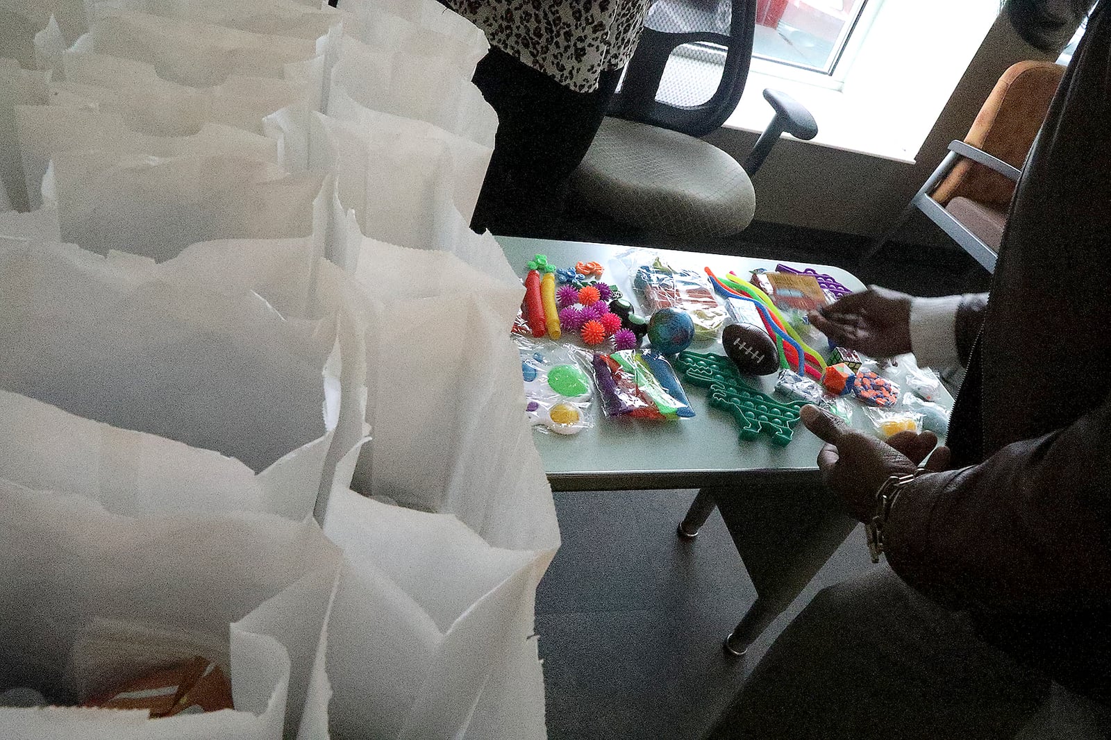 Toys and snacks the Rocking Horse Center gives the kids as they wait 15 minutes after getting the vaccine. BILL LACKEY/STAFF