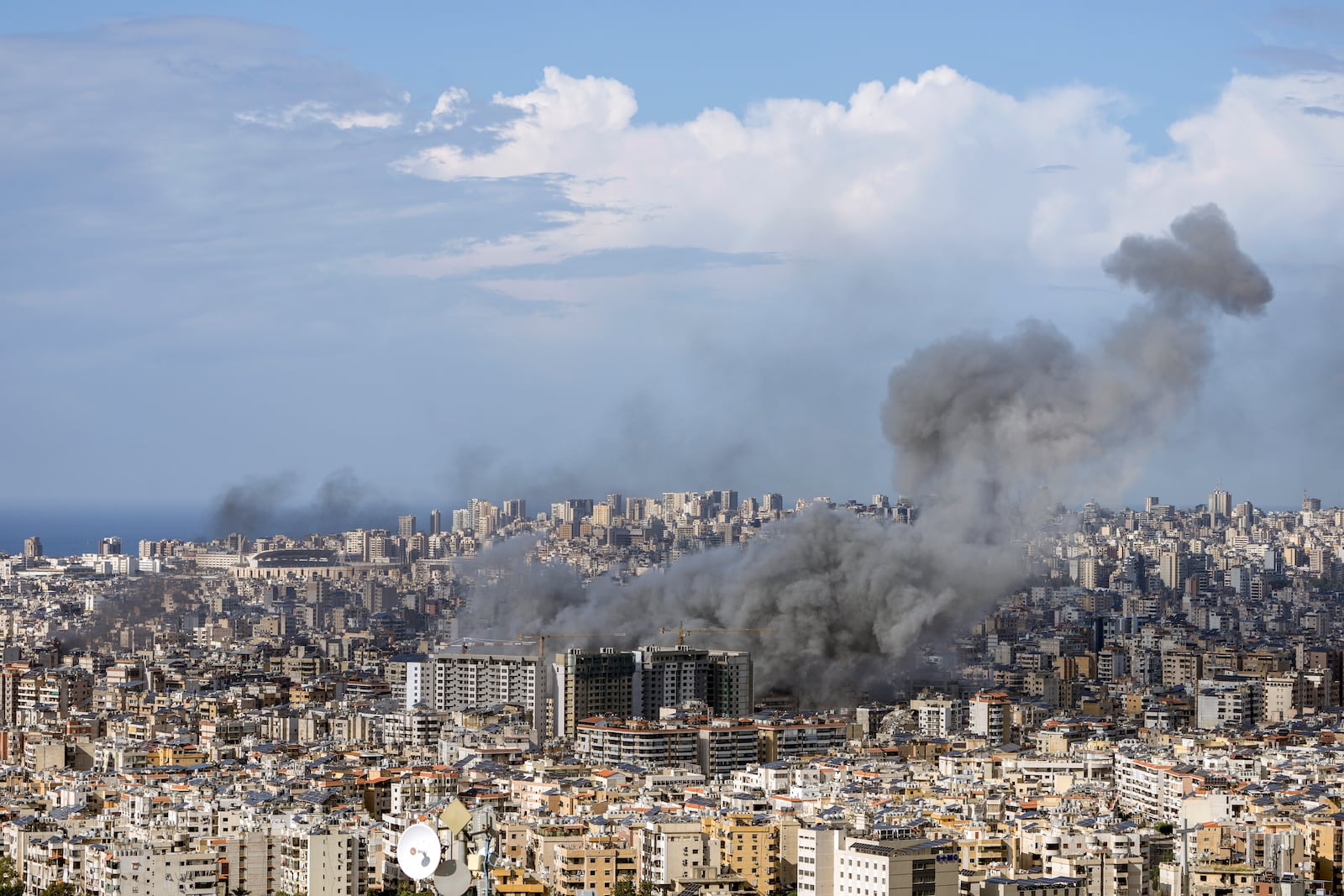 Smoke rises after an Israeli airstrike on Dahiyeh, in the southern suburb of Beirut, Lebanon, Thursday, Nov. 21, 2024. (AP Photo/Bilal Hussein)