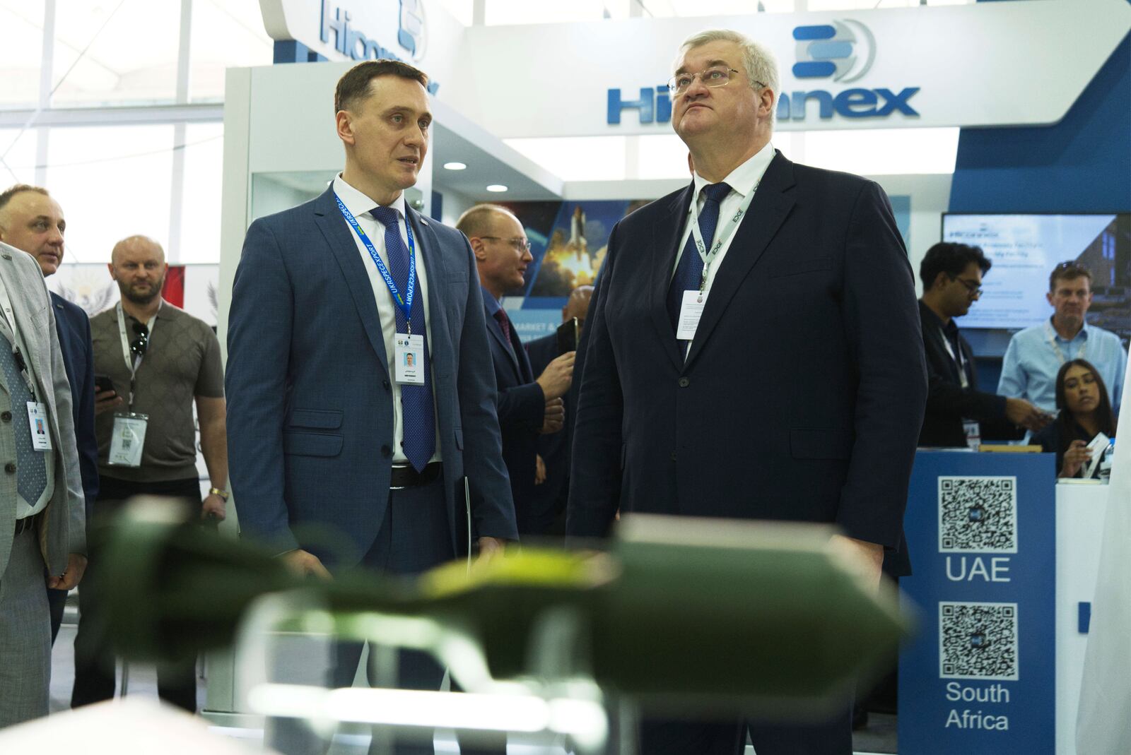 Ukrainian Foreign Minister Andrii Sybiha, right, looks at a stand showing Ukrainian weapons at the biennial International Defense Exhibition and Conference arms show in Abu Dhabi, United Arab Emirates, Monday, Feb. 17, 2025. (AP Photo/Jon Gambrell)