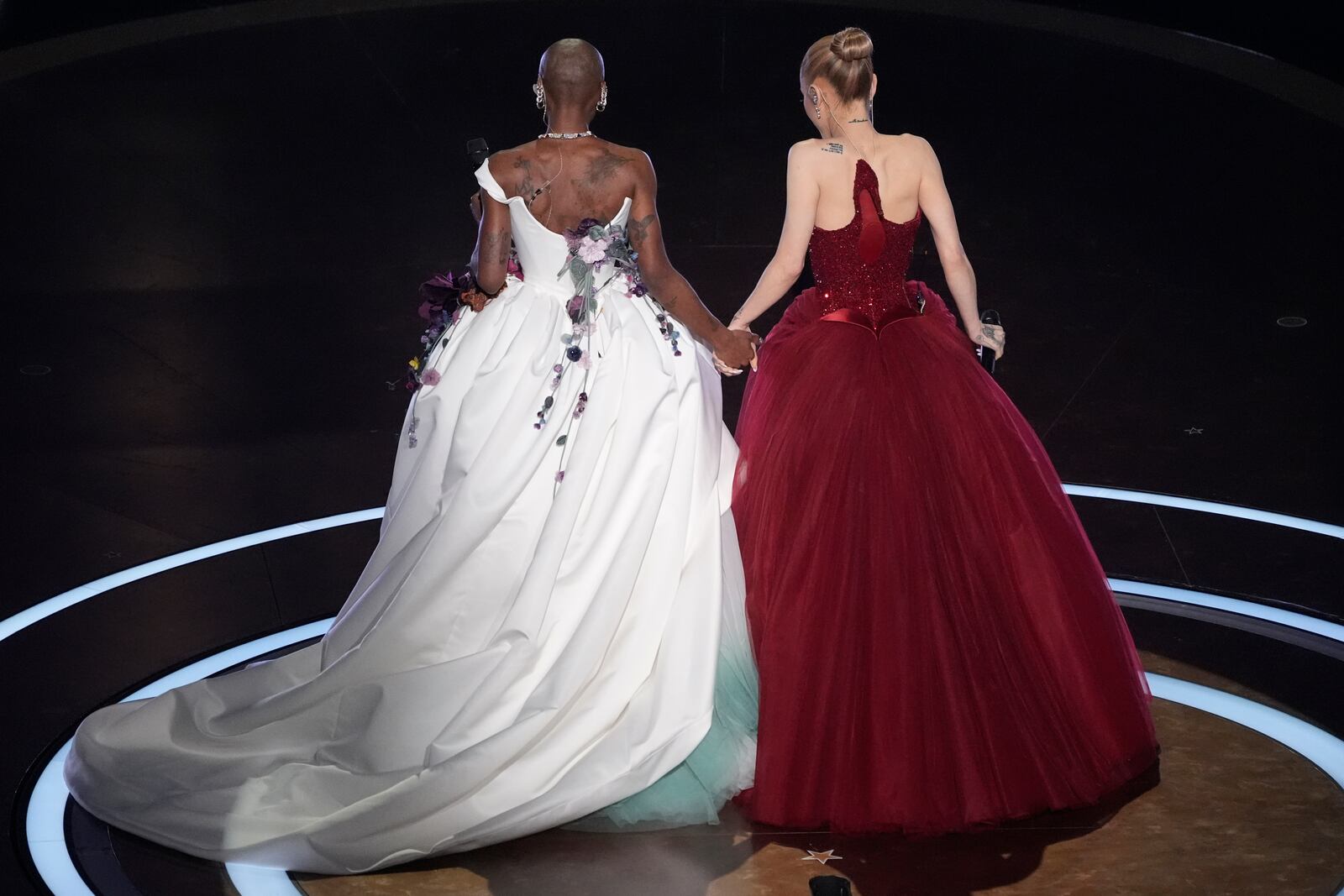 Cynthia Erivo left, and Ariana Grande on stage during the Oscars on Sunday, March 2, 2025, at the Dolby Theatre in Los Angeles. (AP Photo/Chris Pizzello)