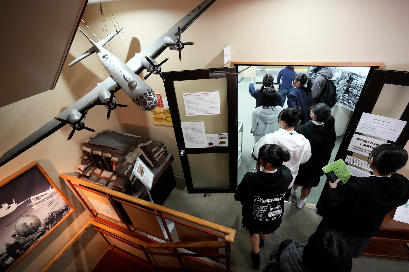 Middle school students from Niigata on a school trip visit the exhibits at the Center of the Tokyo Raids and War Damage, on Feb. 24, 2025, in Tokyo. (AP Photo/Eugene Hoshiko) (AP Photo/Eugene Hoshiko)