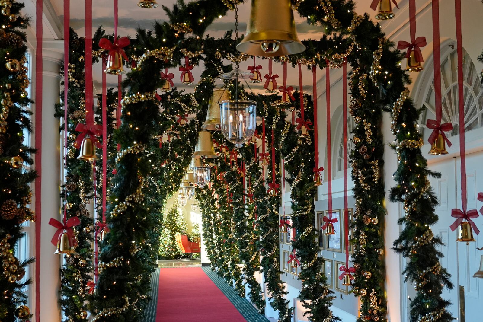 The East Colonnade of the White House in Washington, is decorated for the holidays, Monday, Dec. 2, 2024. (AP Photo/Susan Walsh)