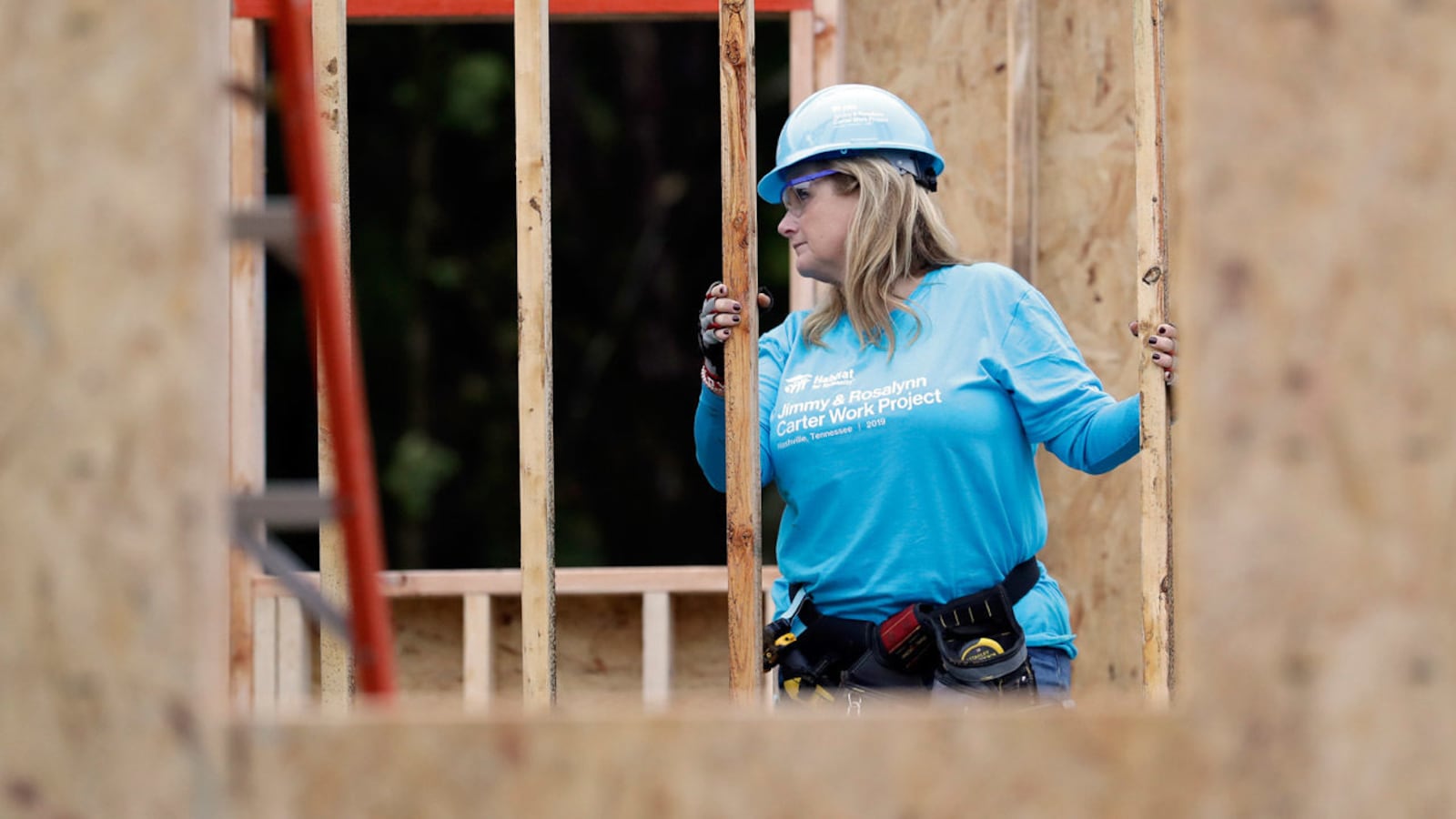 Country music star Trisha Yearwood works at a Habitat for Humanity building project Monday, Oct. 7, 2019, in Nashville, Tenn.