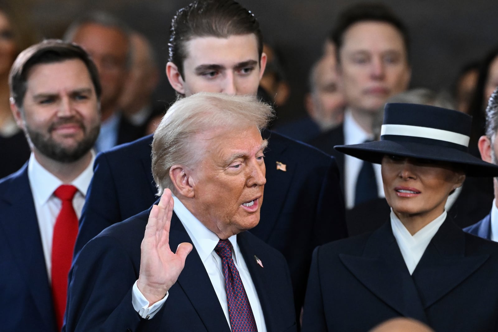 President-elect Donald Trump takes the oath of office during the 60th Presidential Inauguration in the Rotunda of the U.S. Capitol in Washington, Monday, Jan. 20, 2025. (Saul Loeb/Pool photo via AP)