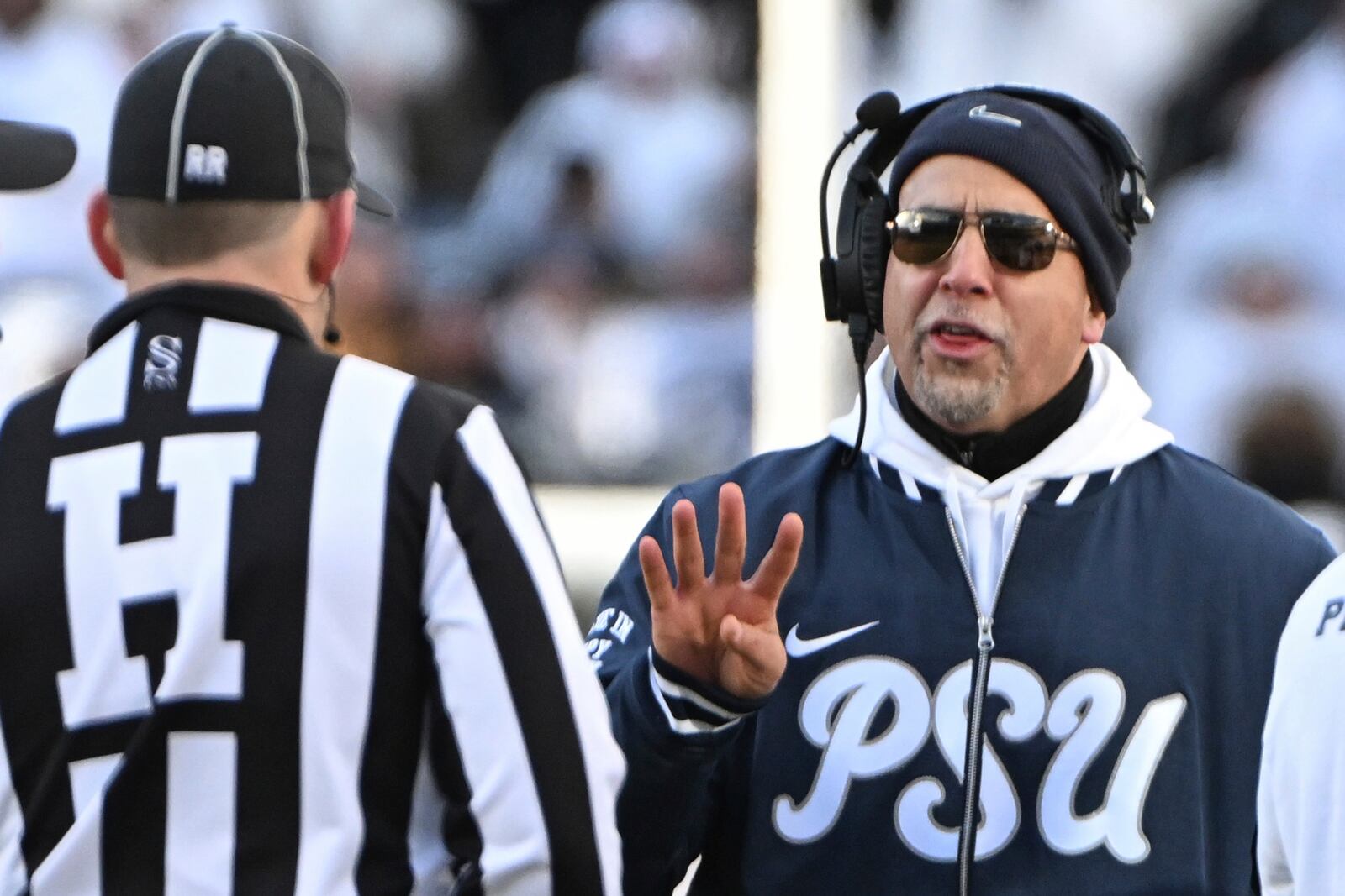 Penn State head coach James Franklin talks with an official during the second half against SMU in the first round of the NCAA College Football Playoff, Saturday, Dec. 21, 2024, in State College, Pa. (AP Photo/Barry Reeger)