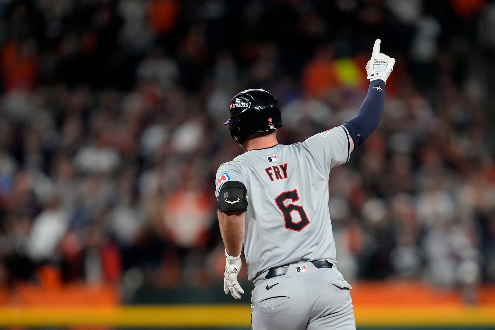 Cleveland Guardians' David Fry celebrates after hitting a two-run home run in the seventh inning during Game 4 of a baseball American League Division Series against the Detroit Tigers, Thursday, Oct. 10, 2024, in Detroit. (AP Photo/Paul Sancya)