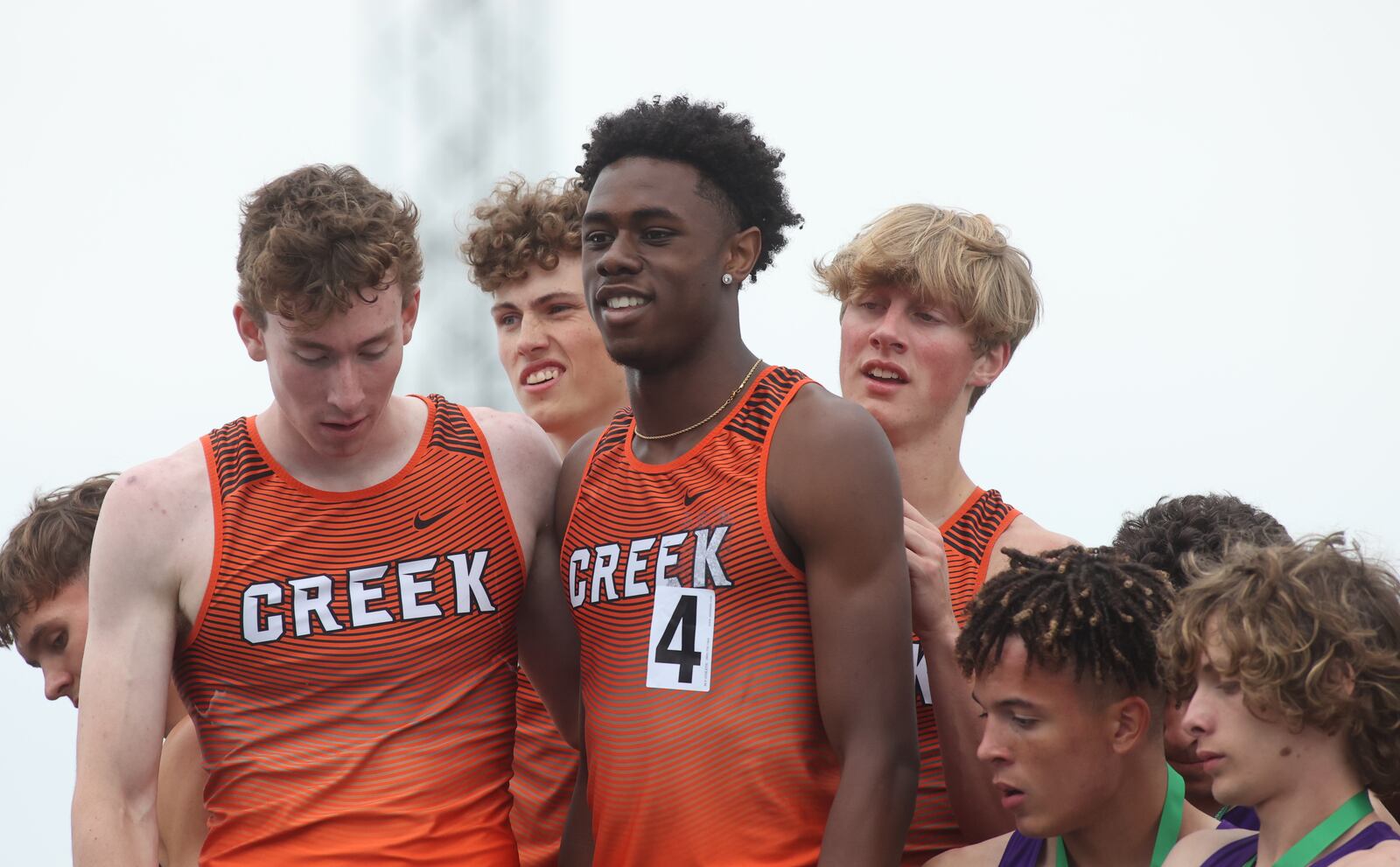 Beavercreek's 4x400-meter relay stands atop the podium after a victory at the Division I state championship on Saturday, June 1, 2024, at Welcome Stadium in Dayton. David Jablonski/Staff