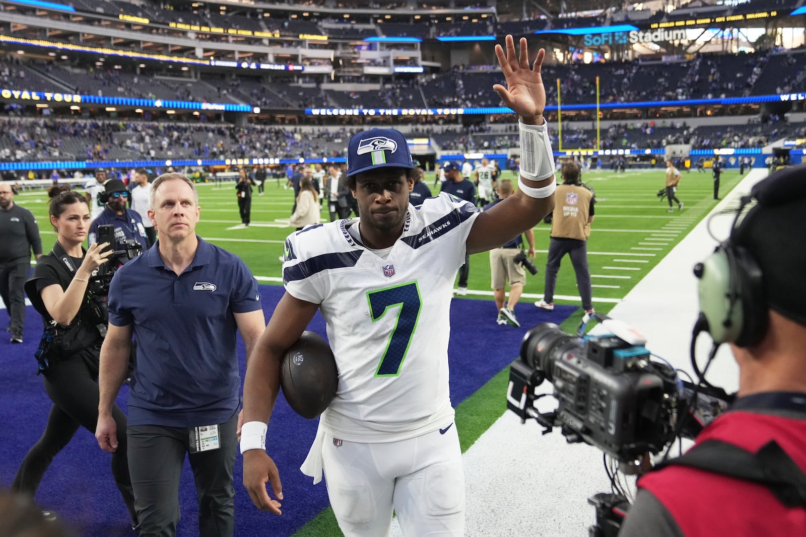 Seattle Seahawks quarterback Geno Smith (7) walks off the field after a win over the Los Angeles Rams in an NFL football game Sunday, Jan. 5, 2025, in Inglewood, Calif. (AP Photo/Eric Thayer)