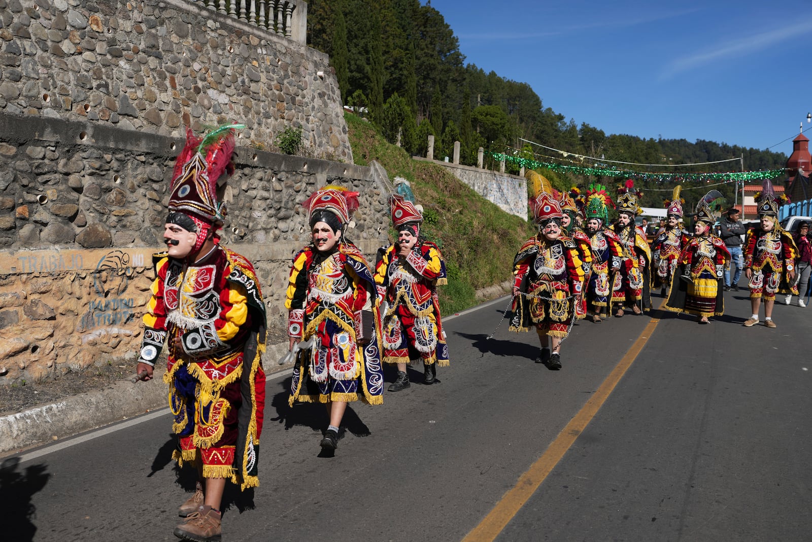 Dancers perform The Dance of the Conquest of Guatemala, depicting Spain's 1524 invasion of the K'iche' kingdom in Tejutla, in Guatemala's San Marcos department, on the feast day of the Black Christ of Esquipulas, Wednesday, Jan. 15, 2025. (AP Photo/Moises Castillo)