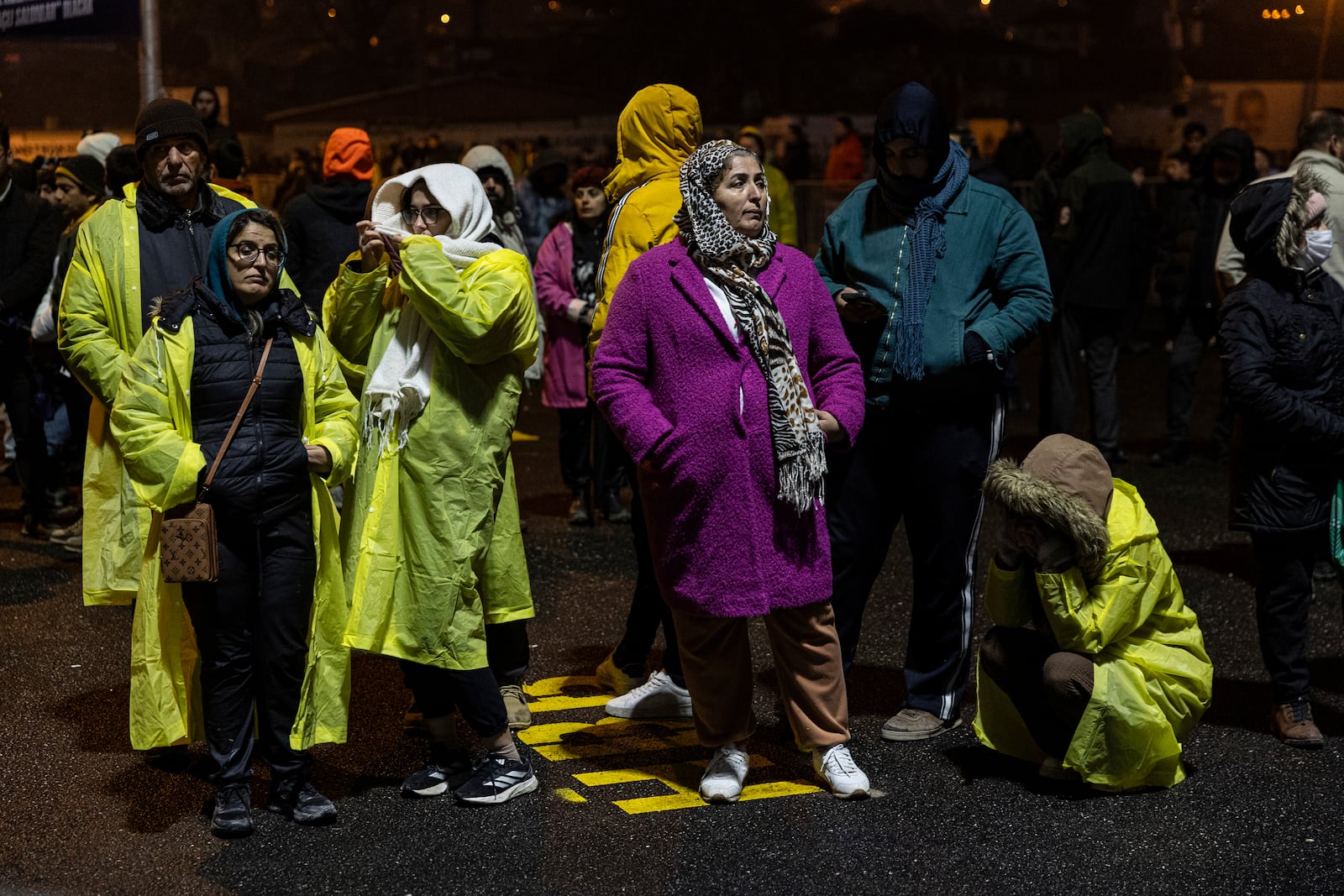 People gather to mark the two-year anniversary of the country's catastrophic earthquake, in Antakya, southern Turkey, early Thursday, Feb. 6, 2025. (Ugur Yildirim/Dia Photo via AP)