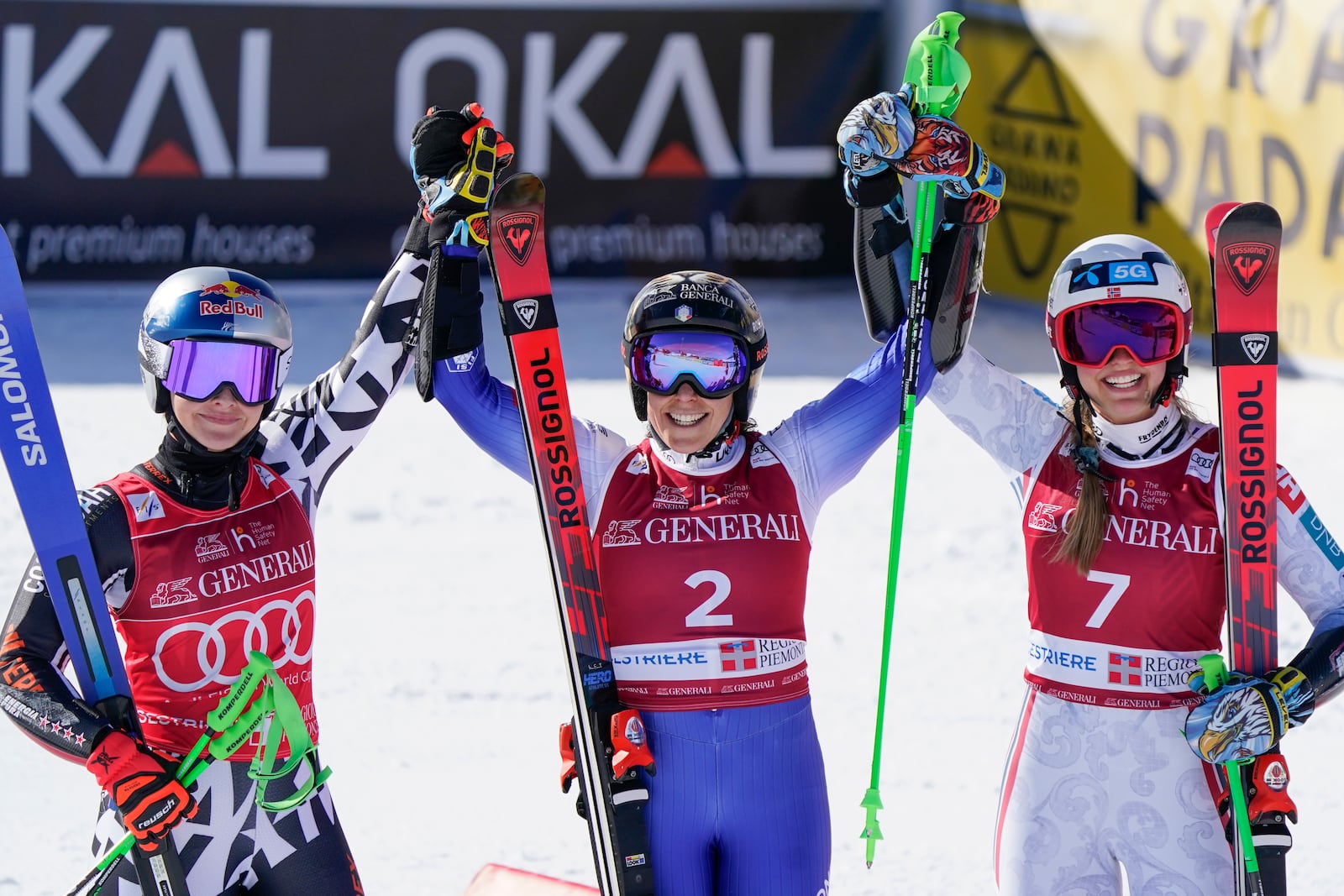 Italy's Federica Brignone, center, winner of an alpine ski, women's World Cup giant slalom, poses with second placed New Zealand's Alice Robinson, left, and third placed Norway's Thea Louise Stjernesund, in Sestriere, Italy, Friday, Feb. 21, 2025. (AP Photo/Marco Tacca)