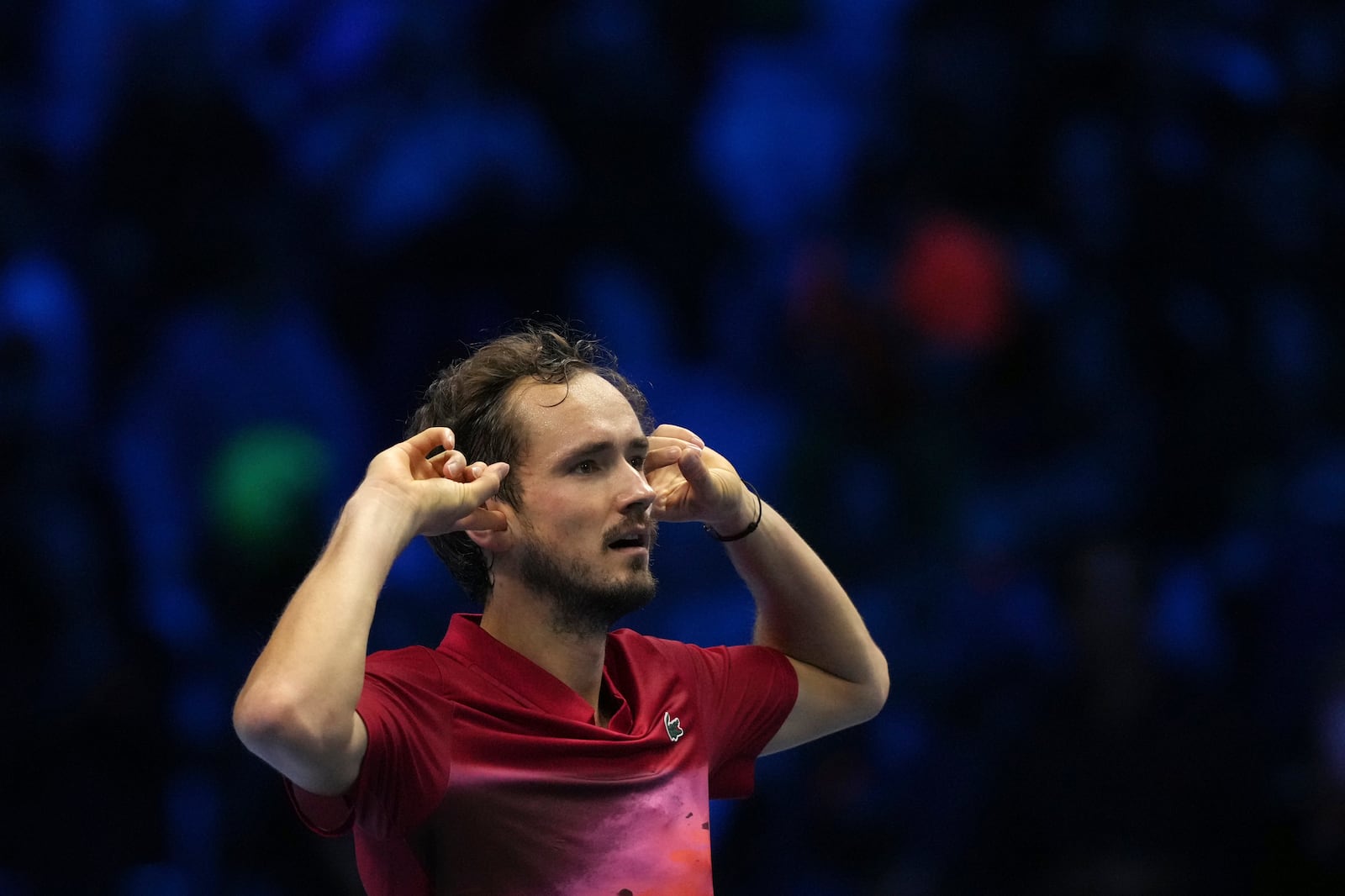 Russia's Daniil Medvedev Australia's Alex de Minaur returns the ball to Russia's Daniil Medvedev Australia's Alex de Minaur during their singles tennis match of the ATP World Tour Finals at the Inalpi Arena, in Turin, Italy, Tuesday, Nov. 12, 2024. (AP Photo/Antonio Calanni)