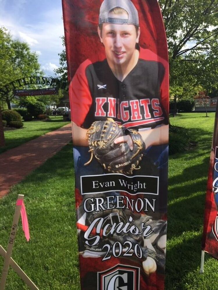 PHOTOS: Enon park features Class of 2020 photo flags to honor graduates