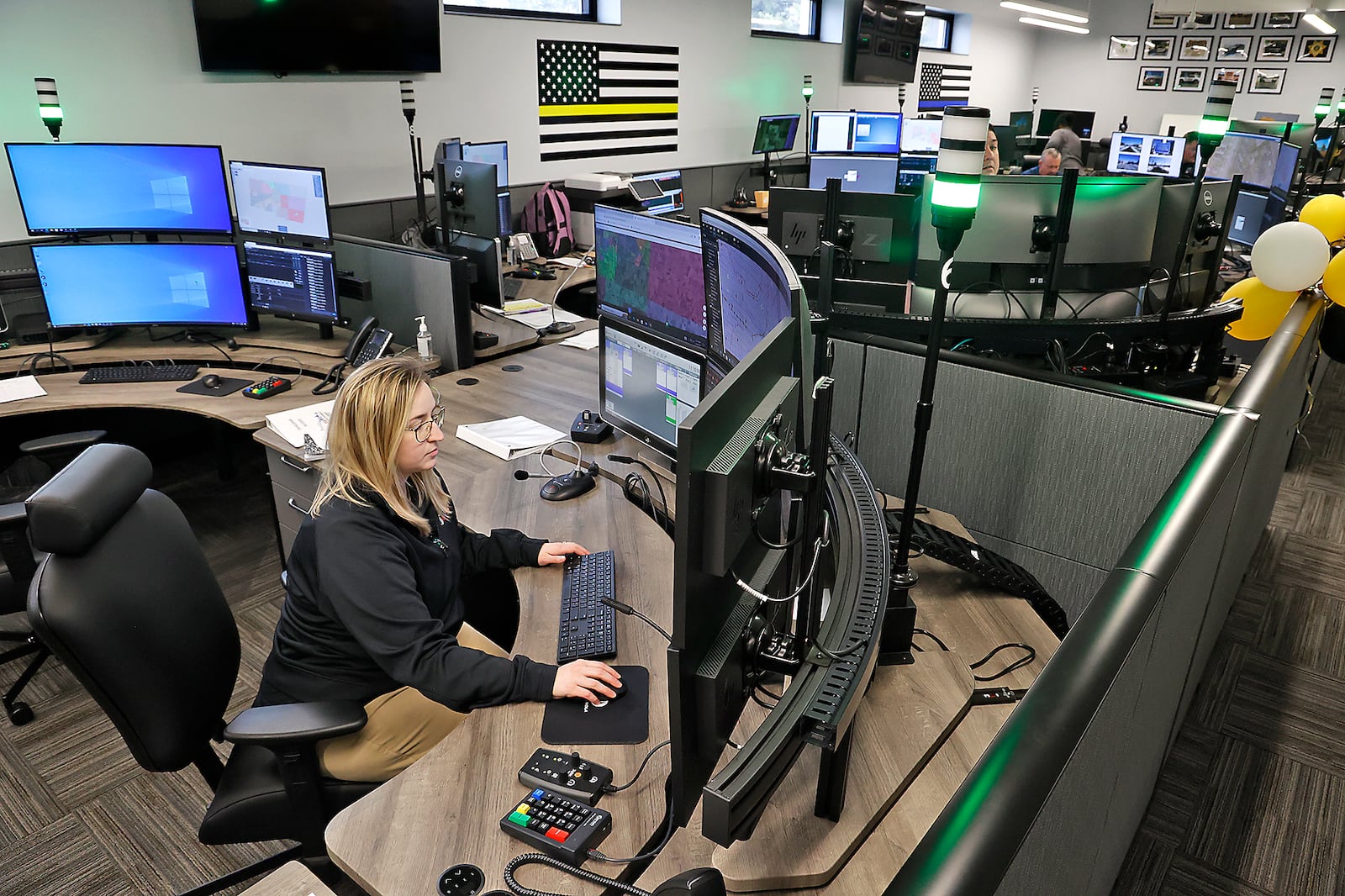 Clark County dispatcher Alexandra Rollins-Gonzalez at work in the new combined Clark County Dispatch Center Tuesday, Feb. 28, 2023. BILL LACKEY/STAFF