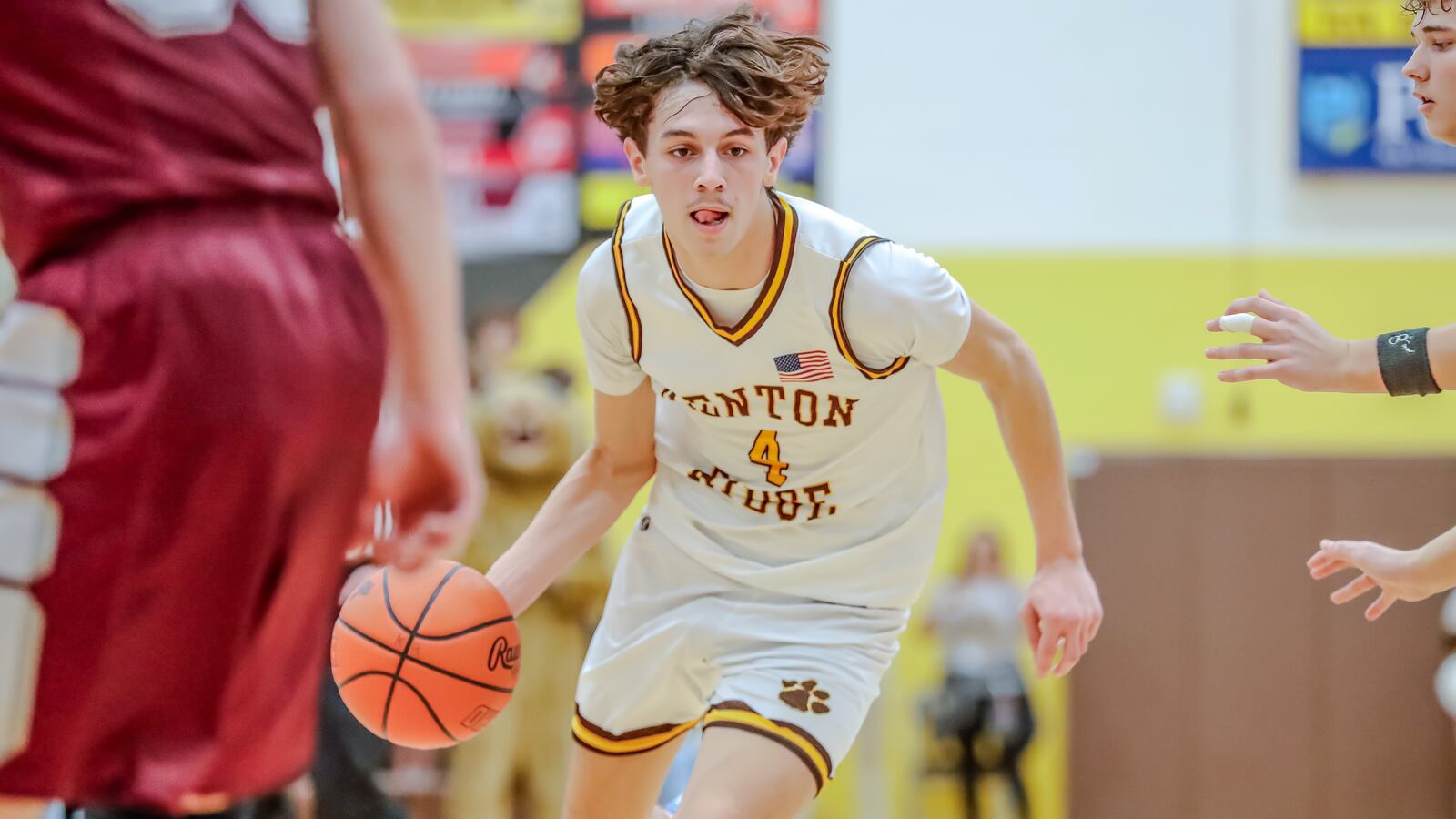 Kenton Ridge High School senior Canye Rogan drives to the hoop during their game against Urbana on Friday night in Springfield. The Cougars won 67-53. Michael Cooper/CONTRIBUTED