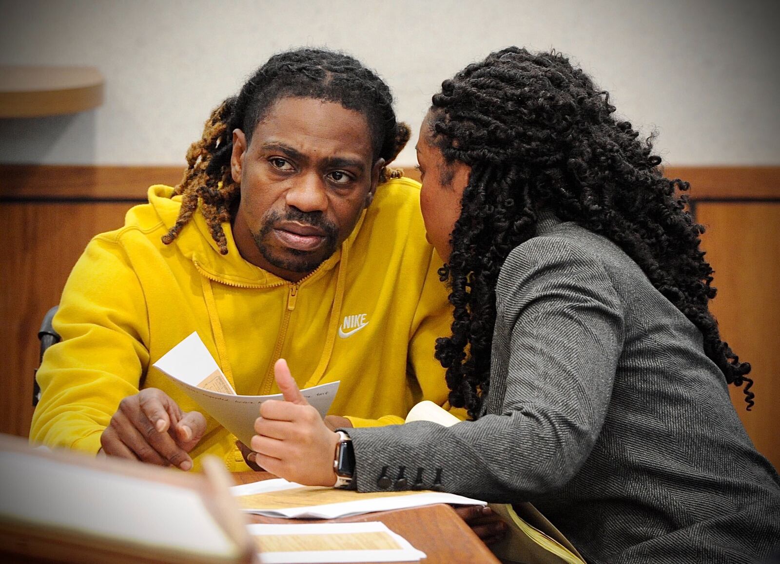 Clifford Owensby talks with his attorney Clarissa Smith during court Monday, Oct. 25, 2021 about the minor traffic misdemeanors of September 30. Owensby was charged for a window tint and seat belt violation. He was found guilty of both traffic violations and fined $150 for each. MARSHALL GORBY\STAFF