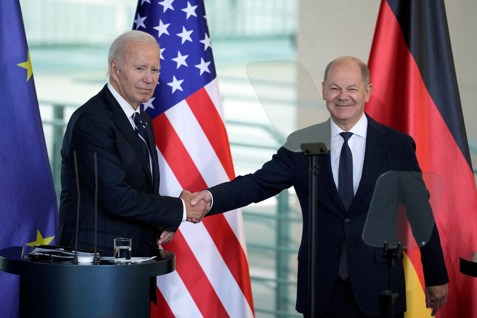 President Joe Biden and German Chancellor Olaf Scholz shake hands after delivering joint statements to the press at the Chancellery in Berlin, Germany, Friday, Oct. 18, 2024. (AP Photo/Ebrahim Noroozi)