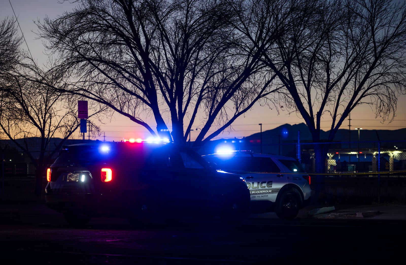 Police respond to a deadly shooting at Kirtland Air Force Base in Albuquerque, N.M., early Saturday, Feb. 22, 2025. (Chancey Bush/The Albuquerque Journal via AP)