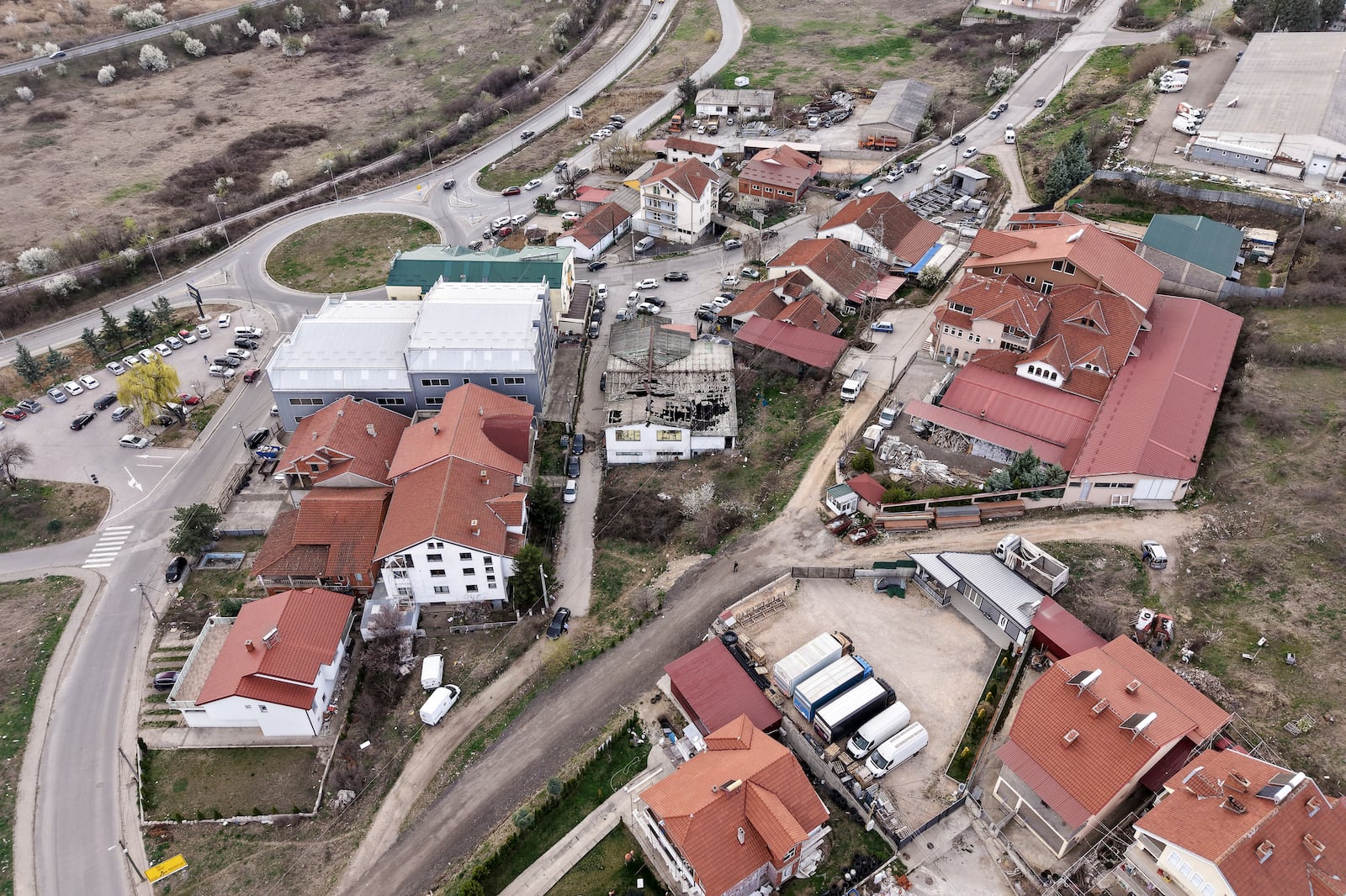 An aerial photograph shows the site of a nightclub in the town of Kocani, North Macedonia, Sunday, March 16, 2025, following a massive fire in the nightclub early Sunday. (AP Photo/Armin Durgut)