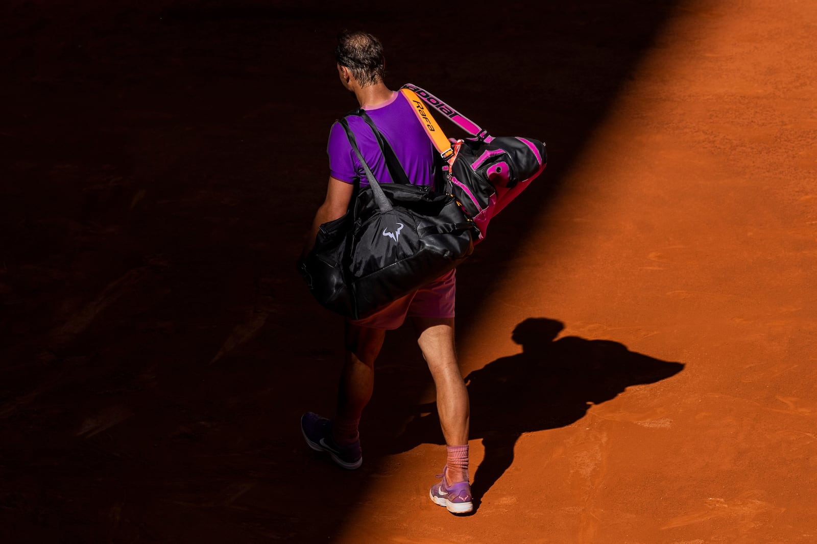 FILE - Spain's Rafael Nadal leaves the court after losing against Germany's Alexander Zverev at the Mutua Madrid Open tennis tournament in Madrid, Spain, Friday, May 7, 2021. (AP Photo/Bernat Armangue, File)