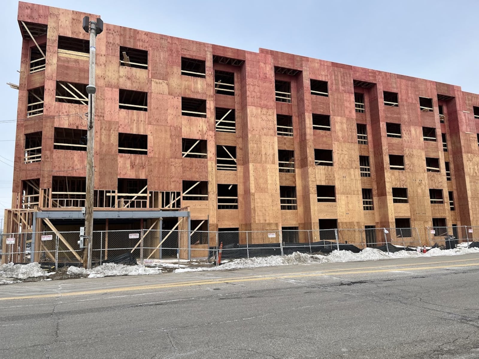 Work continues on new apartments at Second and Webster streets, downtown Dayton, at the former home of Midwest Tool and Engineering Co., 112 Webster St. The building will have will have 102 residential units and 4,750 square feet of ground floor retail space. THOMAS GNAU/STAFF