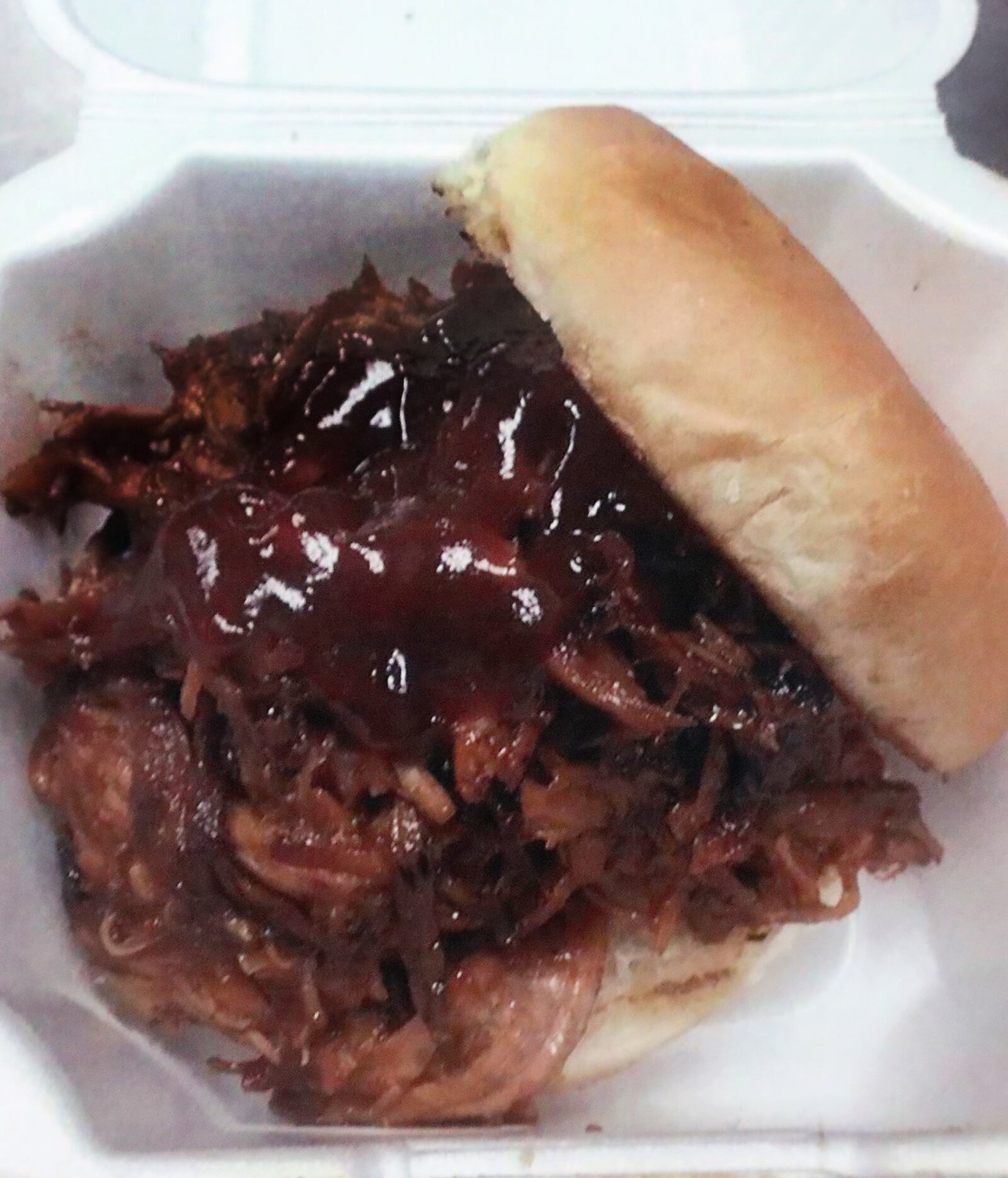 Pulled pork sandwich at Al’s Smokehouse. BILL LACKEY/STAFF