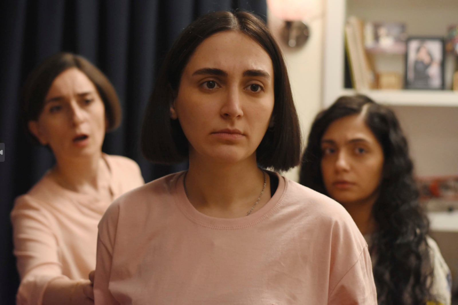 This image released by Neon shows Soheila Golestani, from left, Mahsa Rostami, and Setareh Maleki in a scene from "The Seed of the Sacred Fig." (Neon via AP)