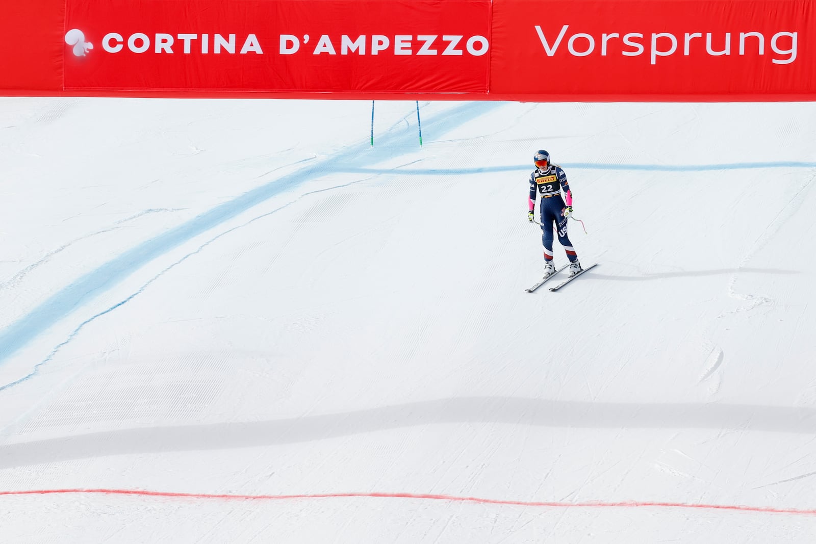 United States' Lindsey Vonn arrives at the finish area after crashing during an alpine ski, women's World Cup Super-G, in Cortina d'Ampezzo, Italy, Sunday, Jan. 19, 2025 (AP Photo/Alessandro Trovati)