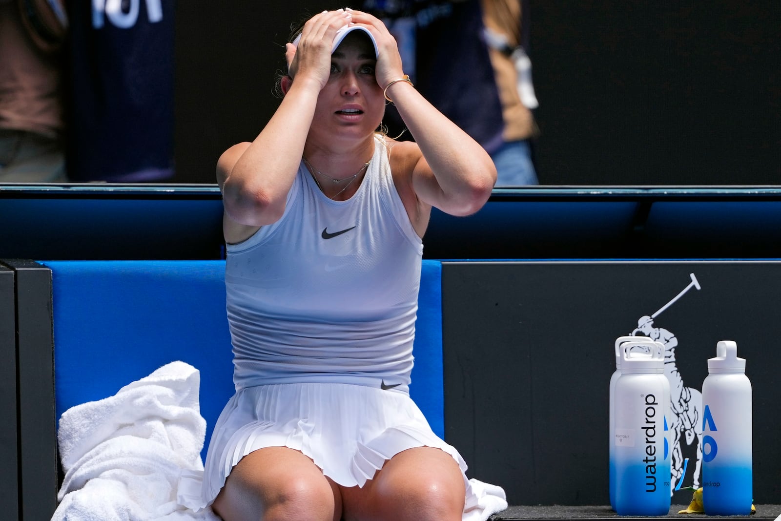 Paula Badosa of Spain reacts after defeating Coco Gauff of the U.S. in their quarterfinal match at the Australian Open tennis championship in Melbourne, Australia, Tuesday, Jan. 21, 2025. (AP Photo/Vincent Thian)