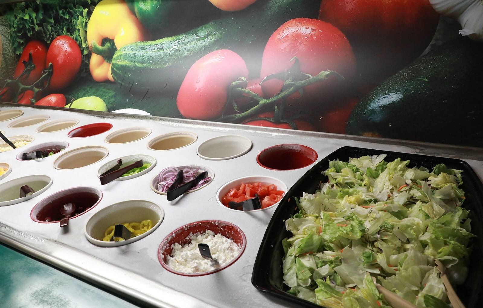 A fresh salad bar at Short Stop Italian Restaurant. BILL LACKEY/STAFF