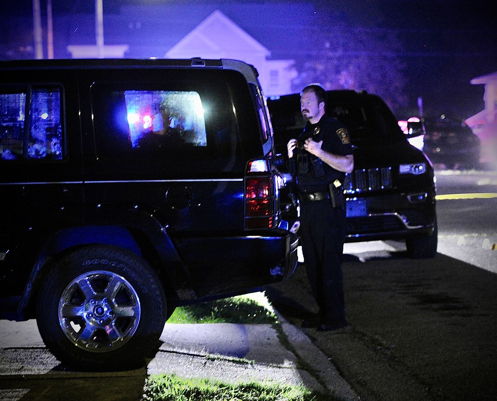 Springfield Police Division officers investigate after a 20-year-old man was fatally shot Saturday night, July 8, 2023, in the 200 block of Rosewood Avenue. MARSHALL GORBY \STAFF