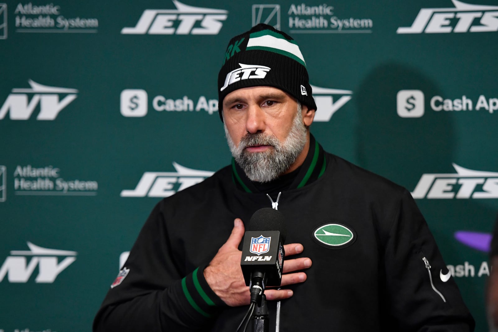 New York Jets head coach Jeff Ulbrich talks to the media following an NFL football game against the Buffalo Bills, Sunday, Dec. 29, 2024, in Orchard Park, N.Y. (AP Photo/Adrian Kraus)