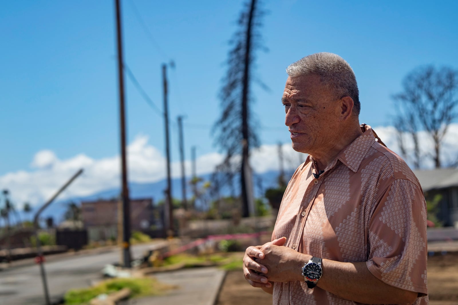 FILE - Maui Mayor Richard Bissen looks on during a media tour on Front Street, showing recovery efforts after 2023's wildfire, June 26, 2024, in Lahaina, Hawaii. (AP Photo/Mengshin Lin, File)