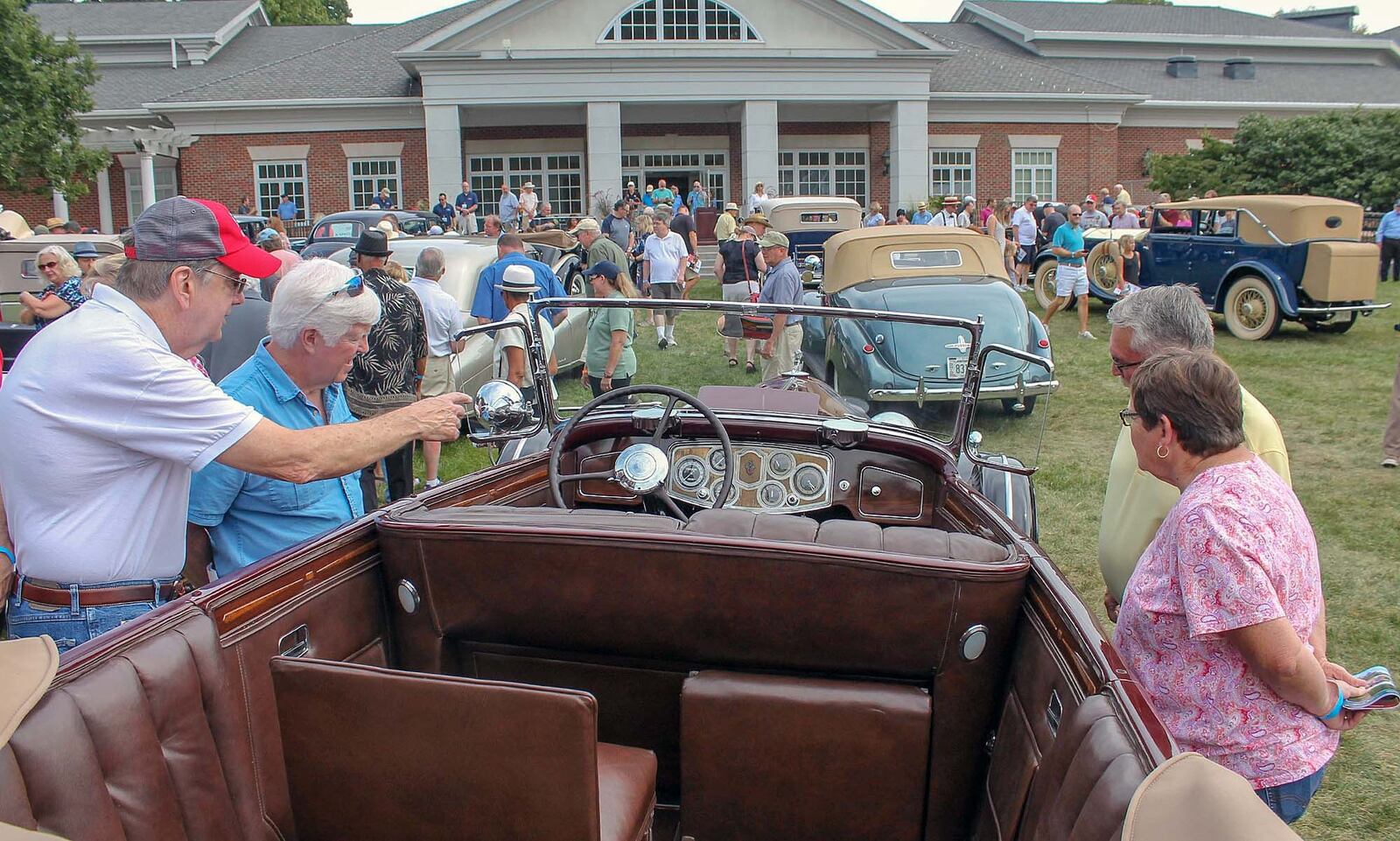 Spectators look over this 1934 Packard Super Eight touring car at the Dayton Concours d’Elegance. Photo by Haylie Schlater