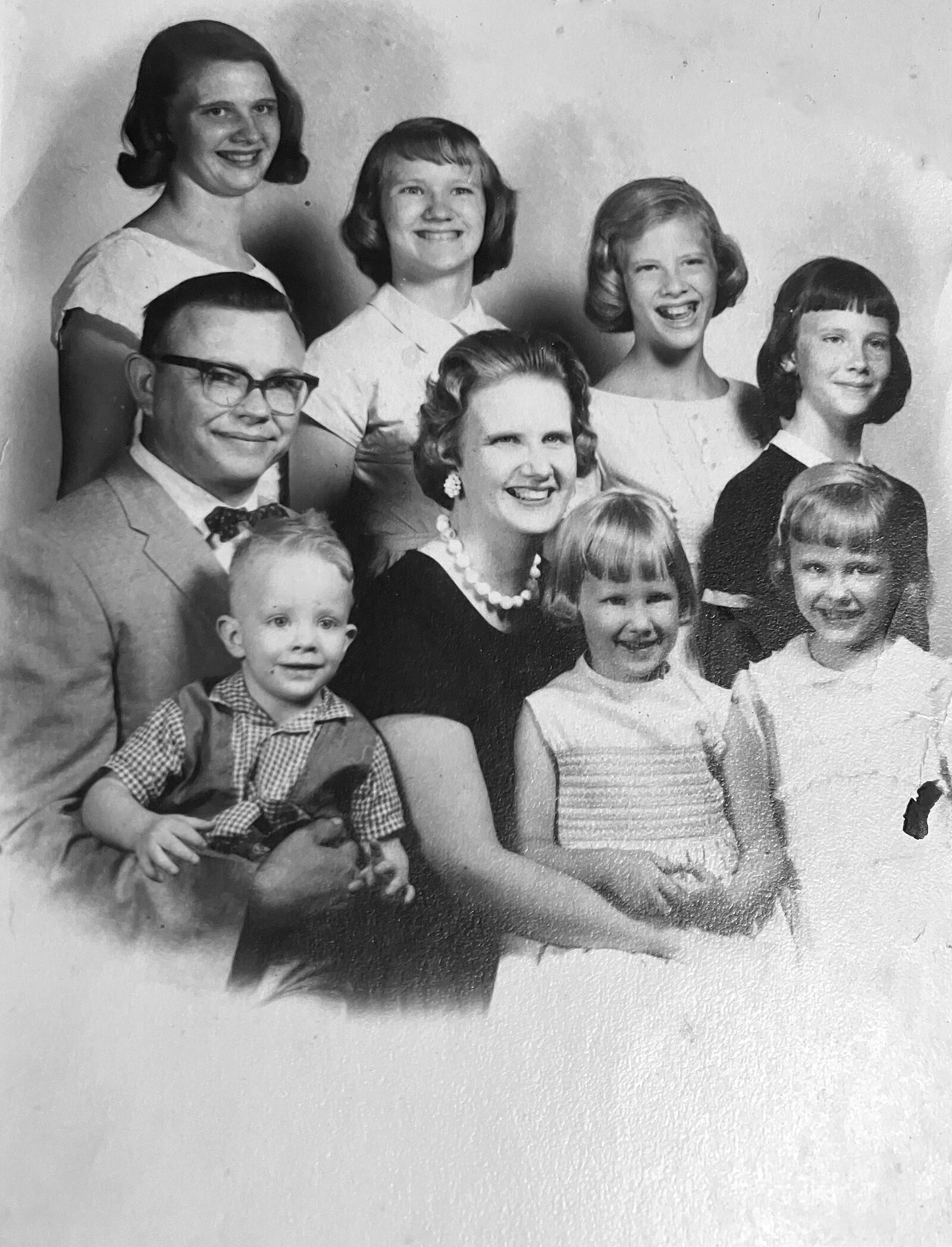 Growing up in a large catholic family, Kaine said she always felt a calling to become a nun.  The Leuser family in 1963 while Kaine was attending Fatima Hall High school in Dayton. L-R Back Row: Jean, Kaine, Mary, Kathleen; Front row: Father Joseph holding son Joseph, mother Eileen holding Joanne and Margaret. Eileen had hoped all of her daughters would become nuns.