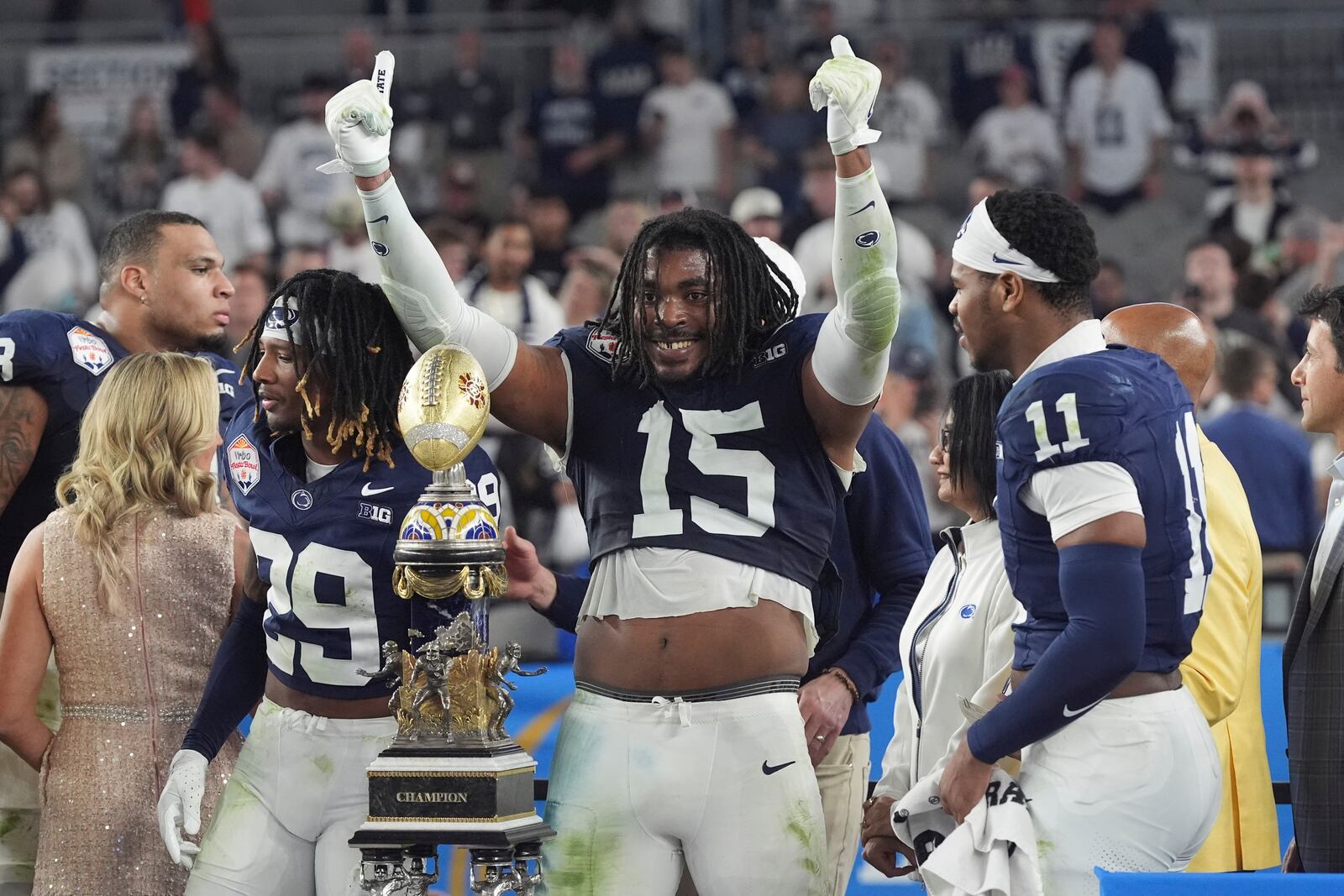 Penn State defensive end Amin Vanover (15) celebrates after the Fiesta Bowl College Football Playoff game against Boise State, Tuesday, Dec. 31, 2024, in Glendale, Ariz. (AP Photo/Ross D. Franklin)