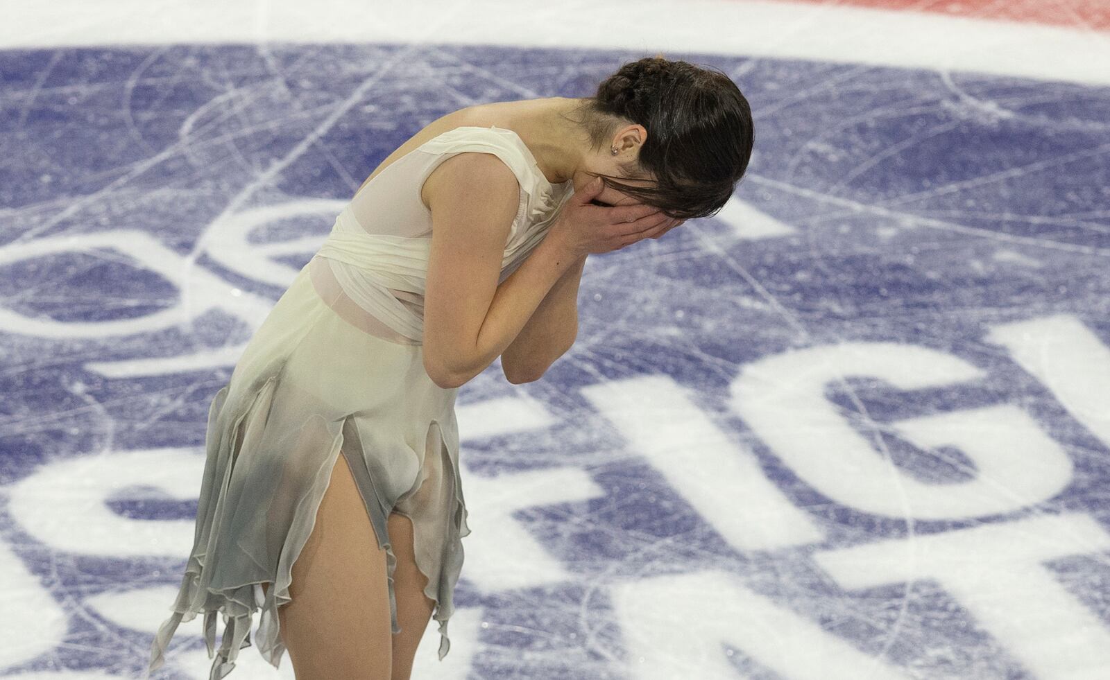 Alysa Liu is overcome after her performance during the women's short program at the U.S. figure skating championships Thursday, Jan. 23, 2025, in Wichita, Kan. (AP Photo/Travis Heying)