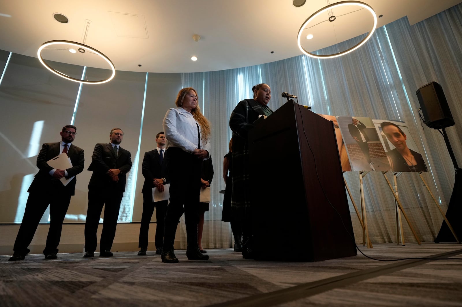 Adriana Vance, mother of Raymond Green who was killed in the Club Q nightclub mass shooting in Colorado Springs, Colo., talks about her son during a news conference announcing the filing of a civil complaint on the two-year anniversary of the deadly mass shooting, Tuesday, Nov. 19, 2024, in Denver. (AP Photo/Jack Dempsey)