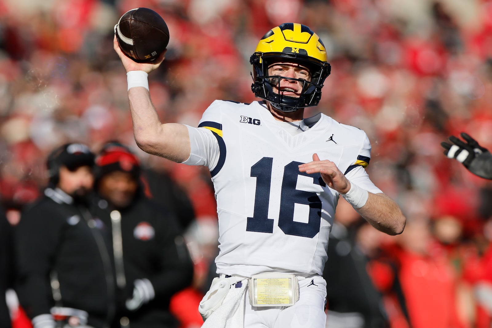 Michigan quarterback Davis Warren throws a pass against Ohio State during the first half of an NCAA college football game Saturday, Nov. 30, 2024, in Columbus, Ohio. (AP Photo/Jay LaPrete)