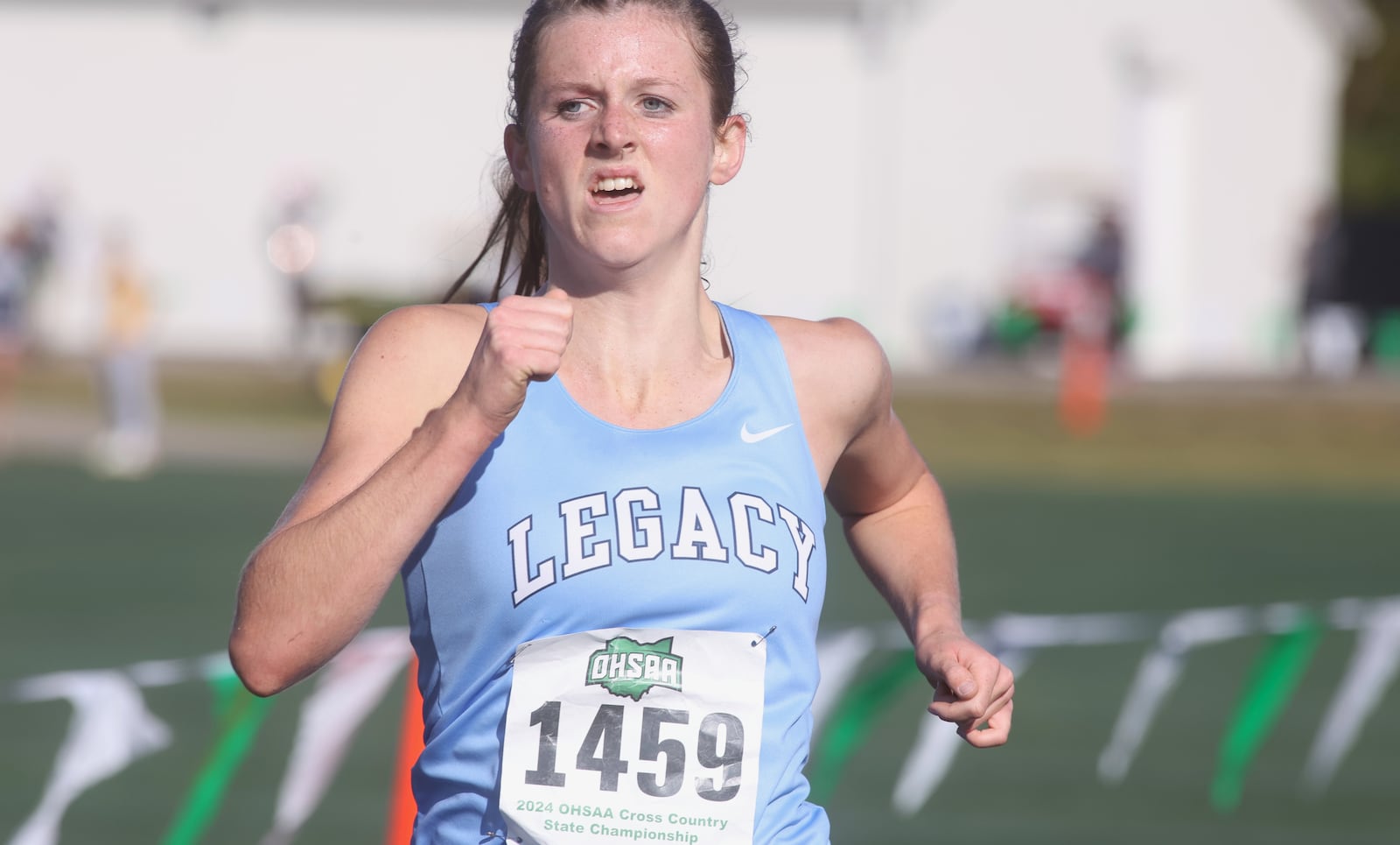 Caroline Hamilton, of Legacy Christian, races to victory in the Division III state cross country championship on Saturday, Nov. 2, 2024, at Fortress Obetz in Obetz. David Jablonski/Staff