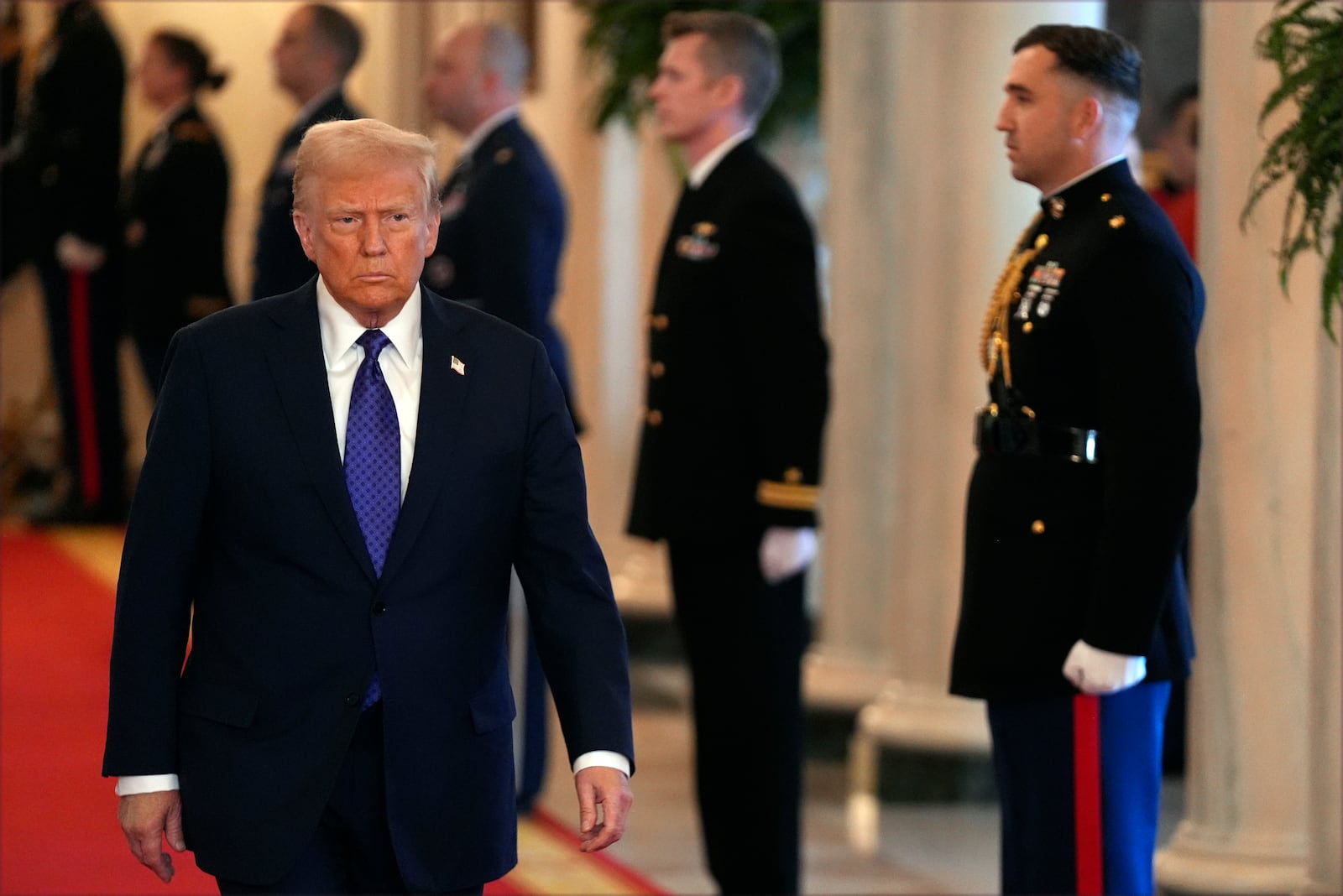 President Donald Trump arrives to sign the Laken Riley Act in the East Room of the White House, Wednesday, Jan. 29, 2025, in Washington. (AP Photo/Evan Vucc)