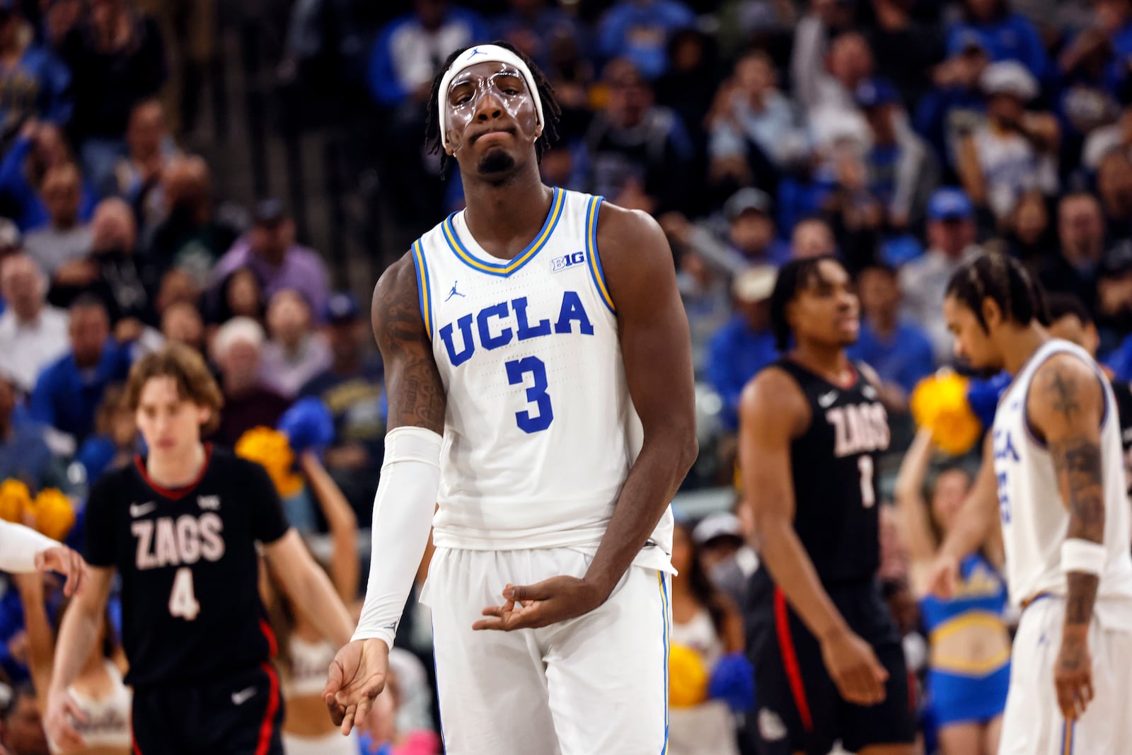 UCLA's Eric Dailey Jr. reacts after scoring a three-pointer during the second half of an NCAA college basketball game against Gonzaga, Saturday, Dec. 28, 2024, in Los Angeles. (AP Photo/Etienne Laurent)