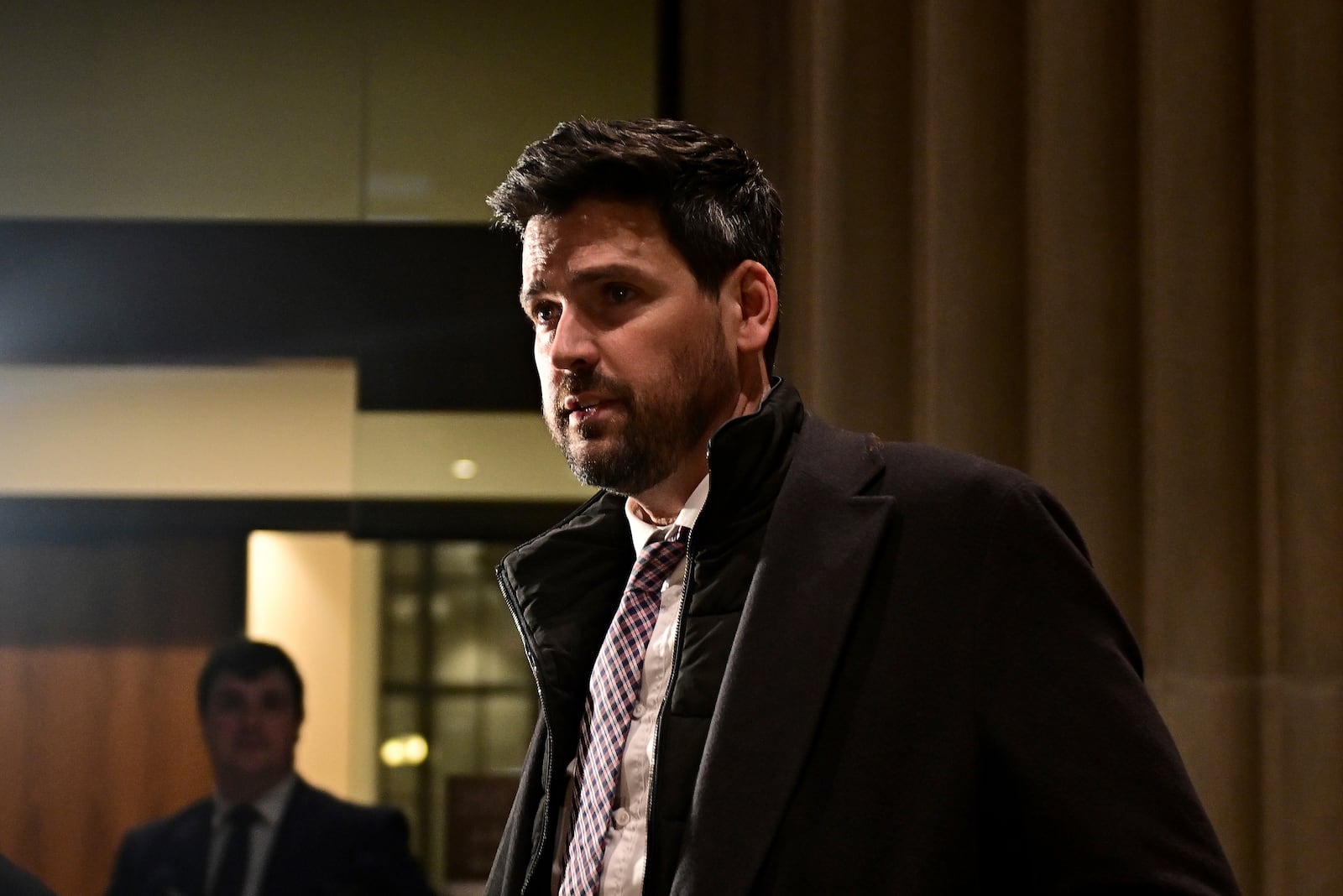 Sean Fraser, who today stepped down as minister of housing, arrives for a national caucus meeting, in Ottawa, Ontario, Monday, Dec. 16, 2024. (Spencer Colby/The Canadian Press via AP)