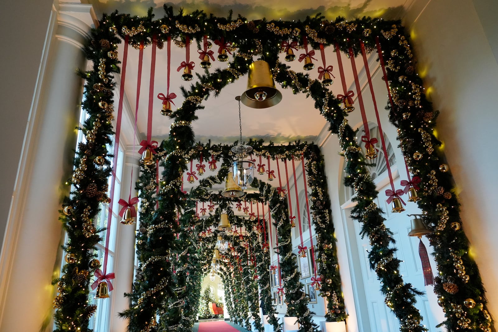 The East Colonnade of the White House in Washington, is decorated for the holidays, Monday, Dec. 2, 2024. (AP Photo/Susan Walsh)