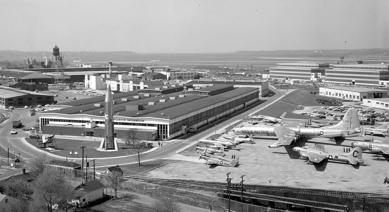 In 1956 the Air Force Technical Museum was redesignated the Air Force Central Museum, and in November 1957 the museum was redesignated again, this time as the Air Force Museum. The museum was placed in an old facility, this time a World War II era structure, and many of the aircraft were put outside in a parking lot. This photogaph was taken in 1963. PHOTO COURTESY OF THE UNITED STATES AIR FORCE.