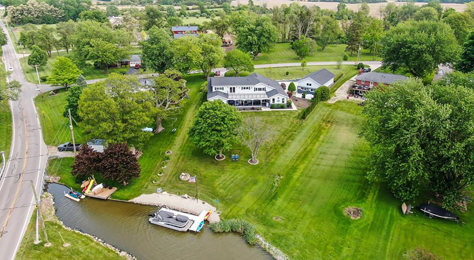 This lakefront property on Lake Sylvan in Clark County has a private boat dock.