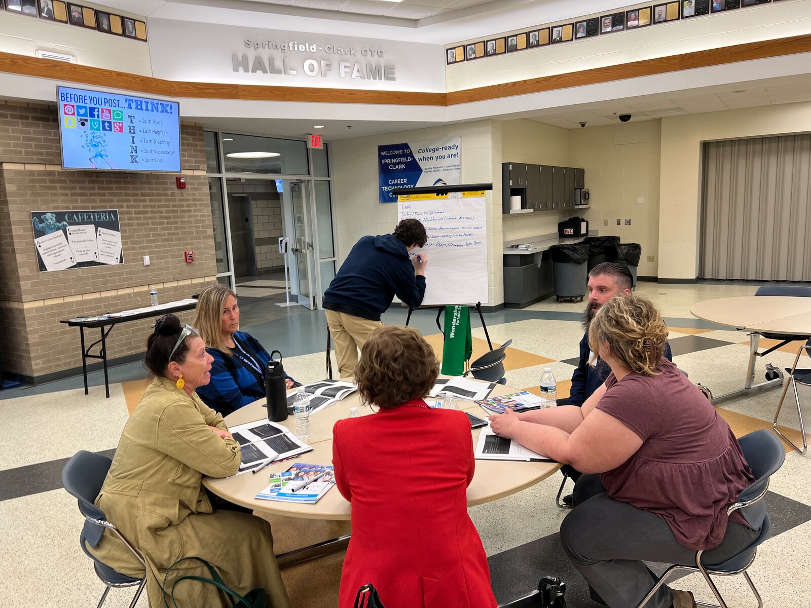 Clark County community leaders met in the Springfield-Clark Career Technology Center (CTC) cafeteria on April 24, to provide input into facility plans to help address the growing demand for up-to-date career technical education. Pictured are: Tyler Gray, at the Post-It pad (CTC Engineering and Architectural Design student); and att the table: Pam Noeth (CTC), Pam Bennett (OSU Extension), Berta Velilla (Miami Valley Child Development Center), Laurel Lemmer (CTC) and Eric Barge (CTC). Contributed